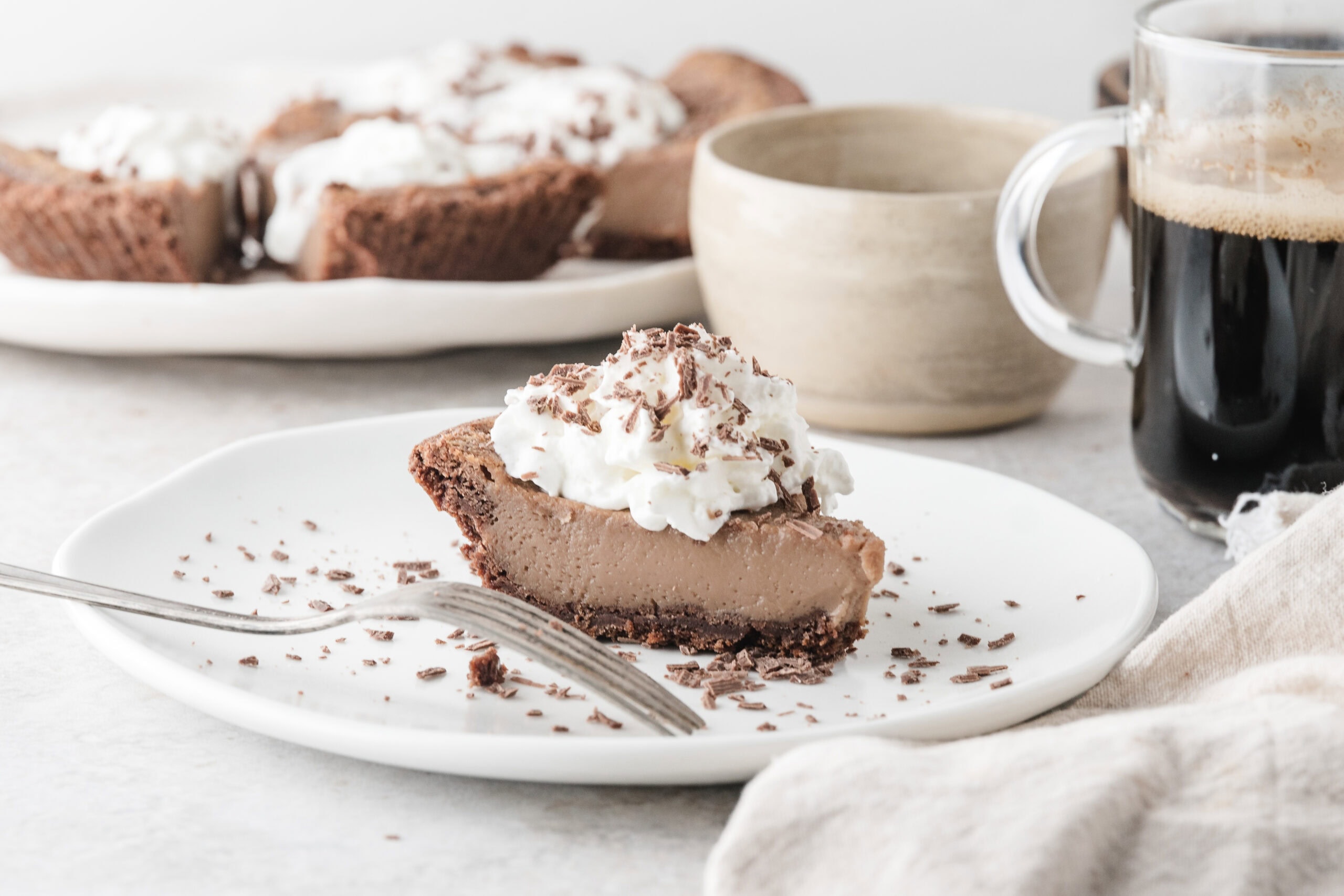 one slice of Grandma's chocolate pie on white plate