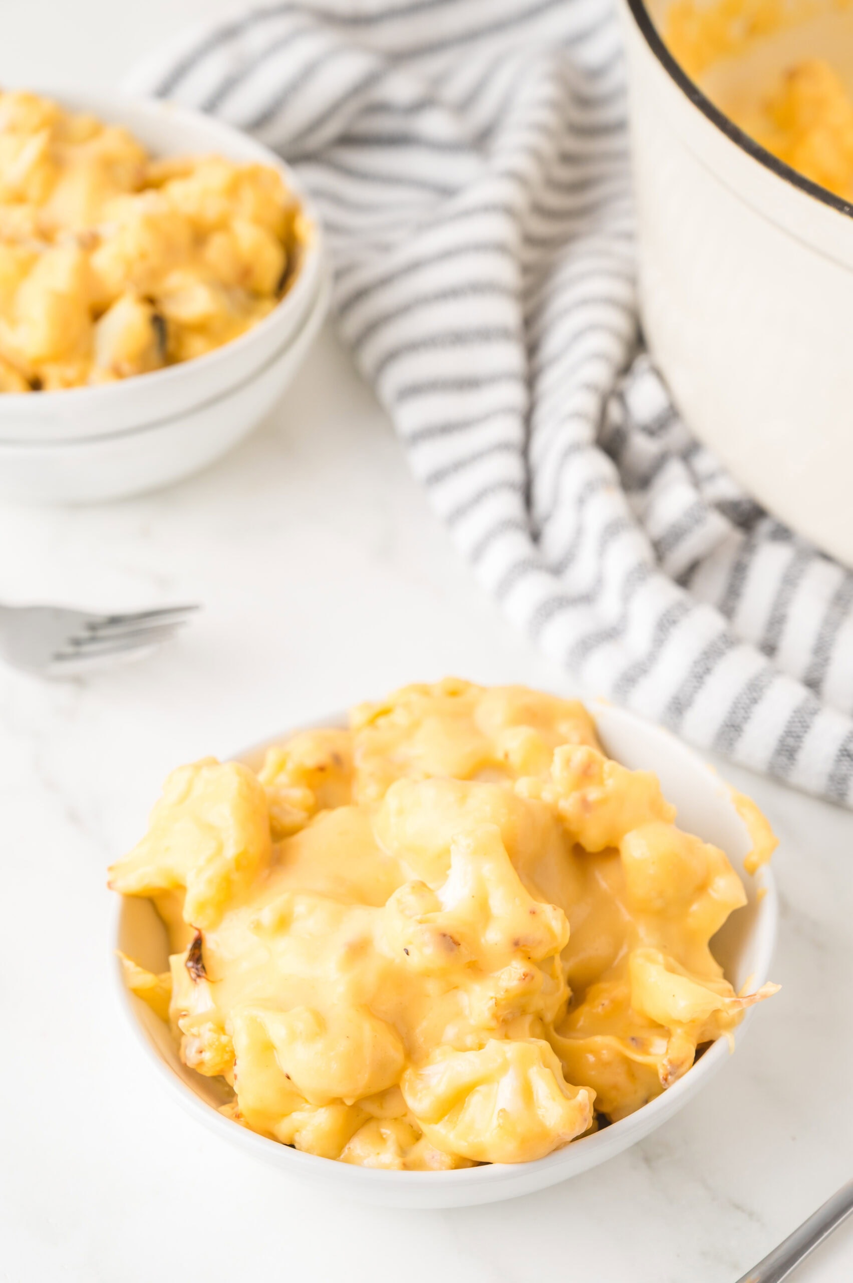 Plated cauliflower mac & cheese ready to be enjoyed