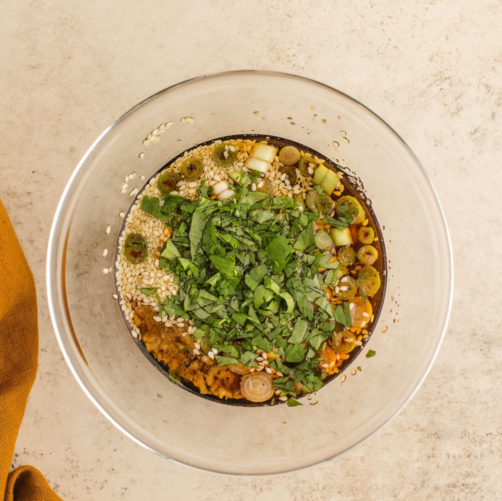 All ingredients to prepare the dumpling dipping sauce in mixing bowl