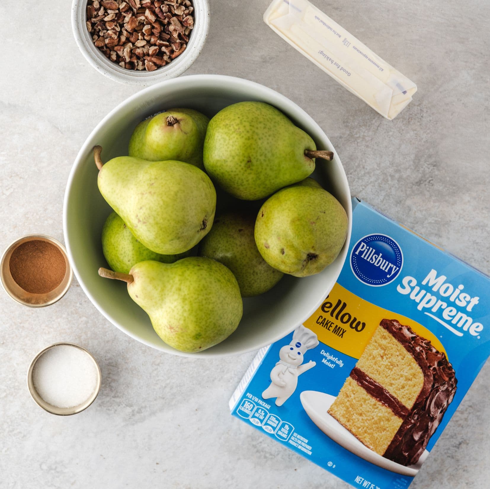 All the ingredients are shown ready to make Pear Crisp with fresh pears