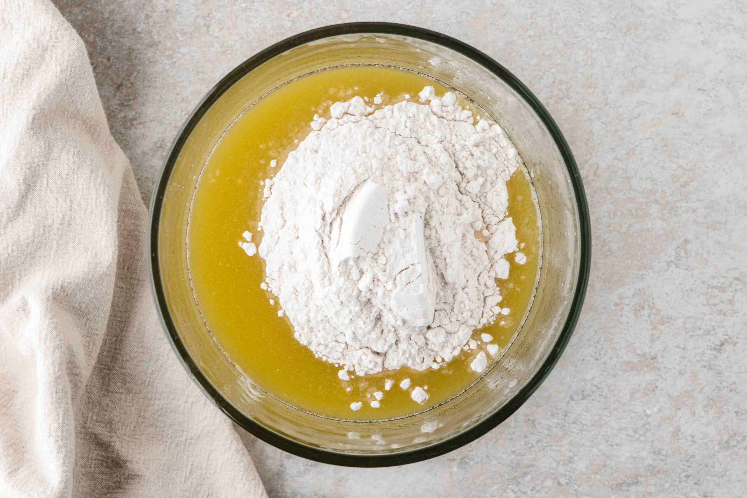 Creating the shortbread bar layer starting mixing flour