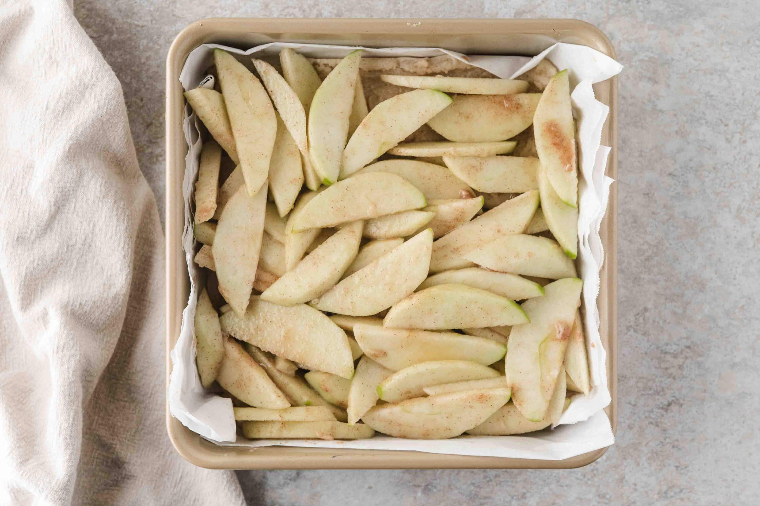 Spiced apples in a single layer in a pan