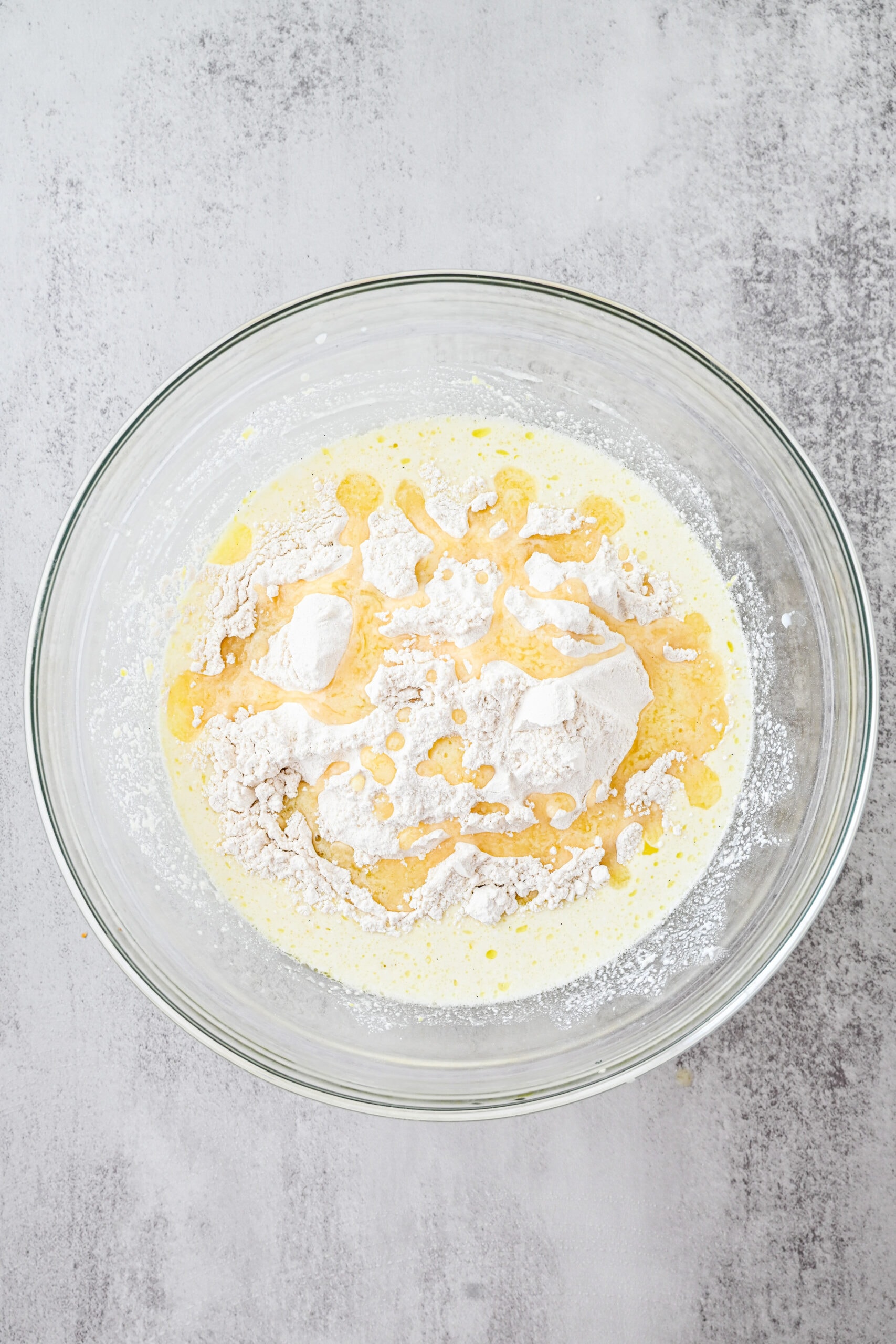 The next process step is to whisk flour, baking soda and salt to the mixture in the same large bowl