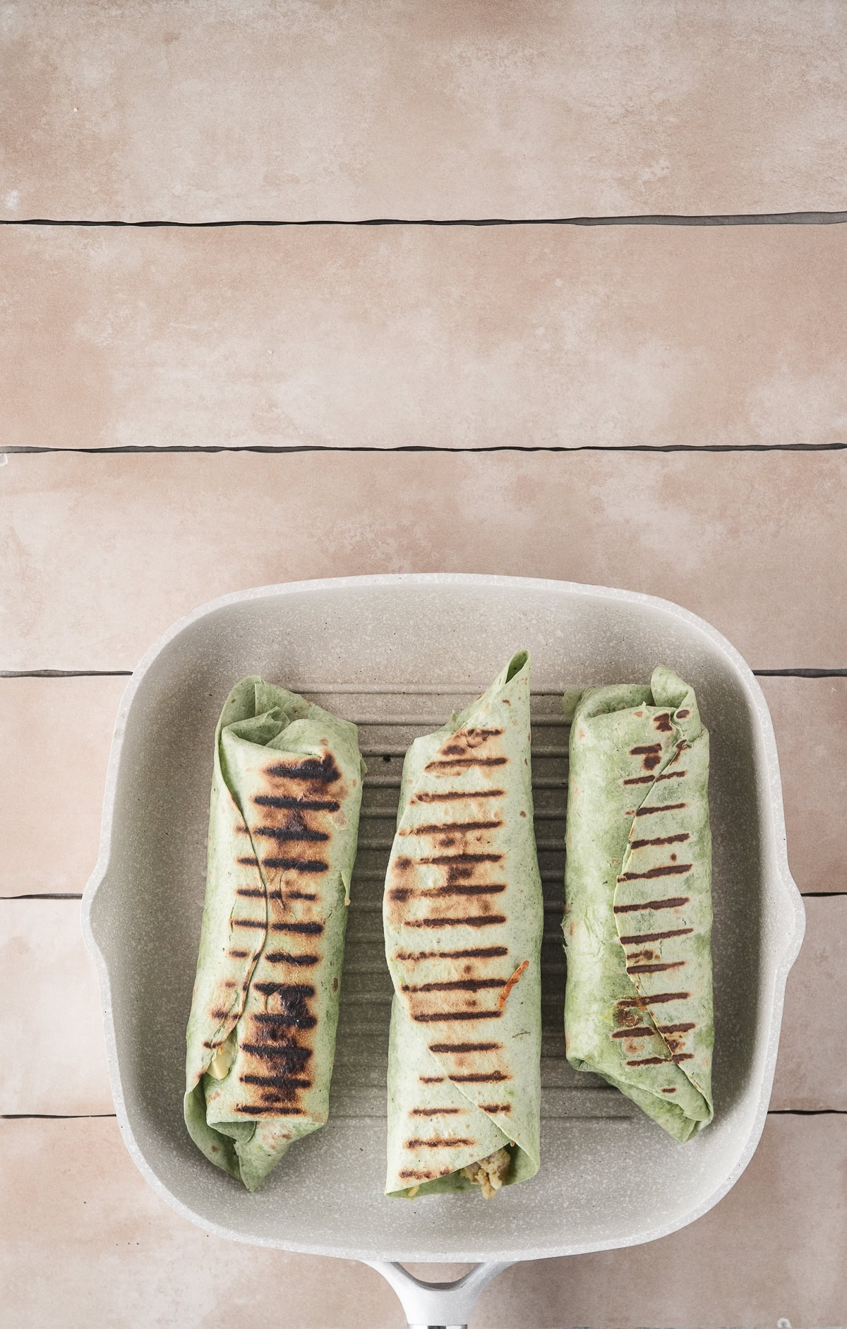 Egg mixture that you put together in the pan, the egg mixture is rolled up inside a tortilla and placed on a grill pan