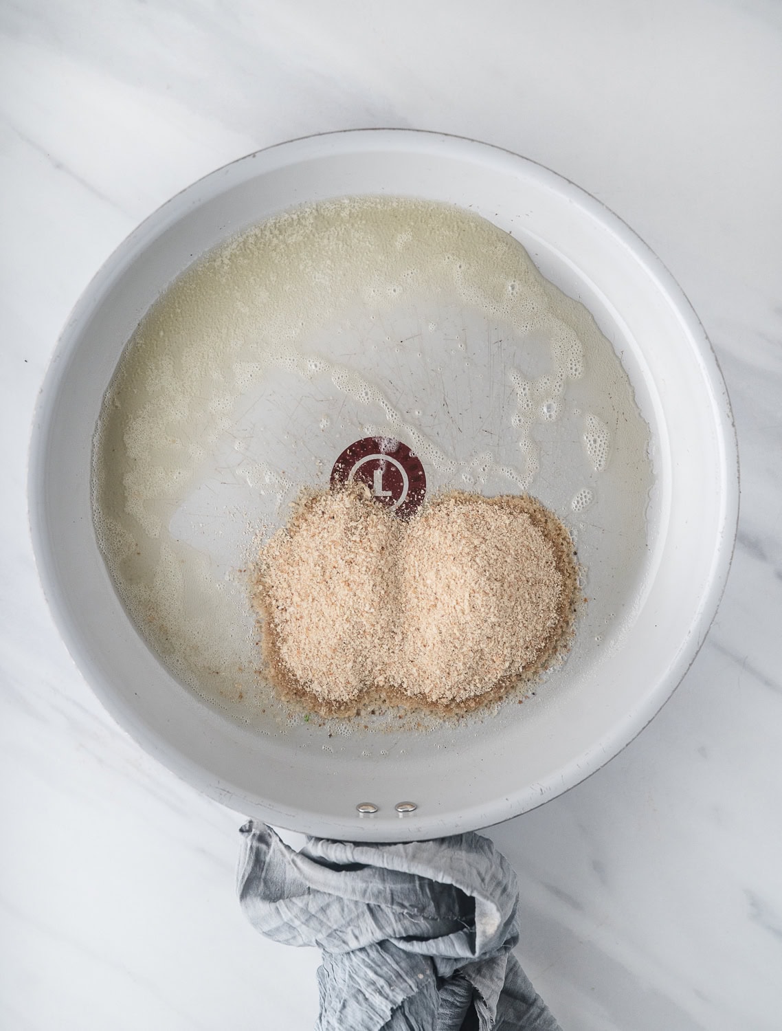 Butter is melted in skillet and ready for the breadcrumbs to be toasted up