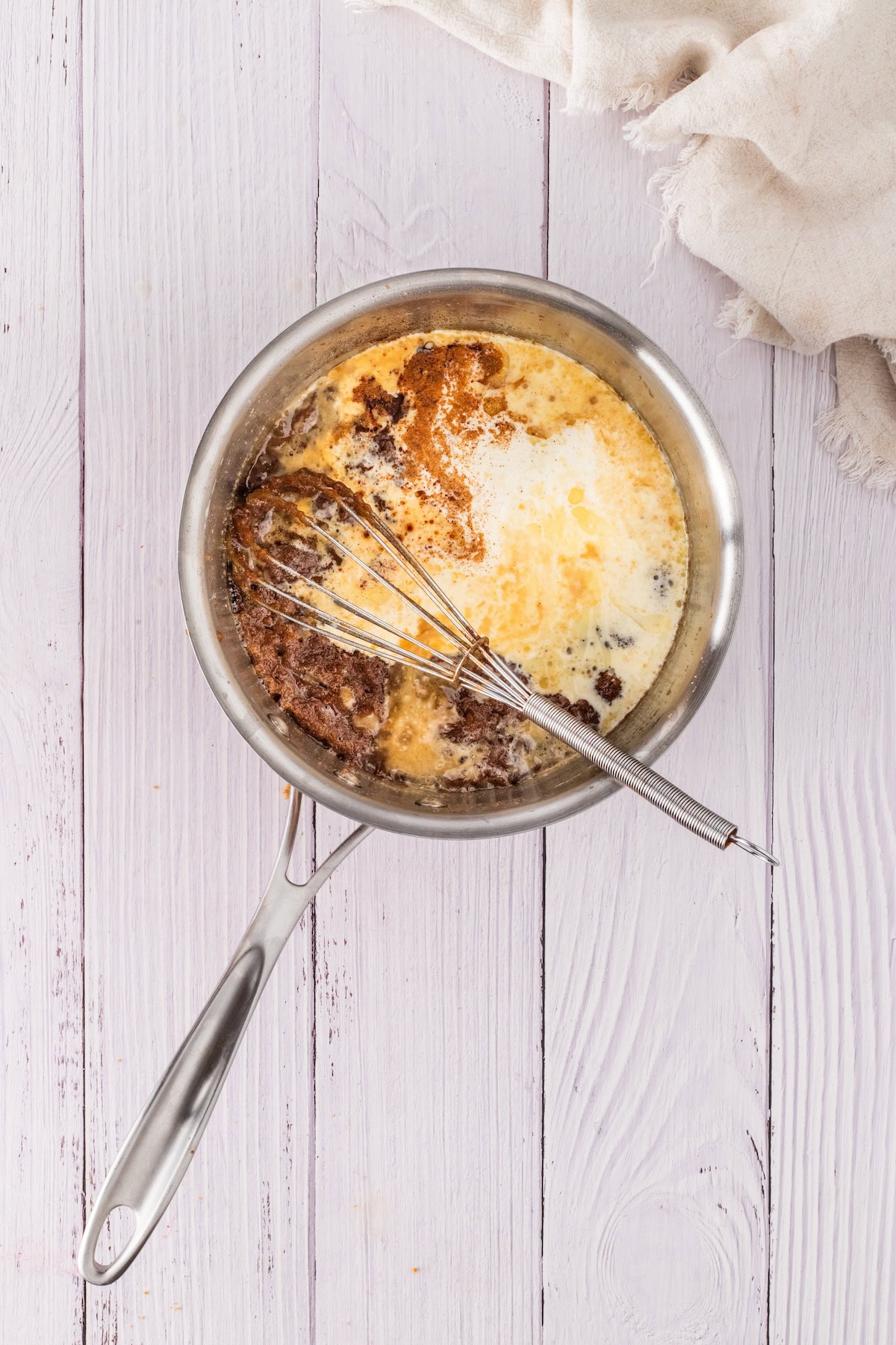 add the cream and sugars to the melted butter