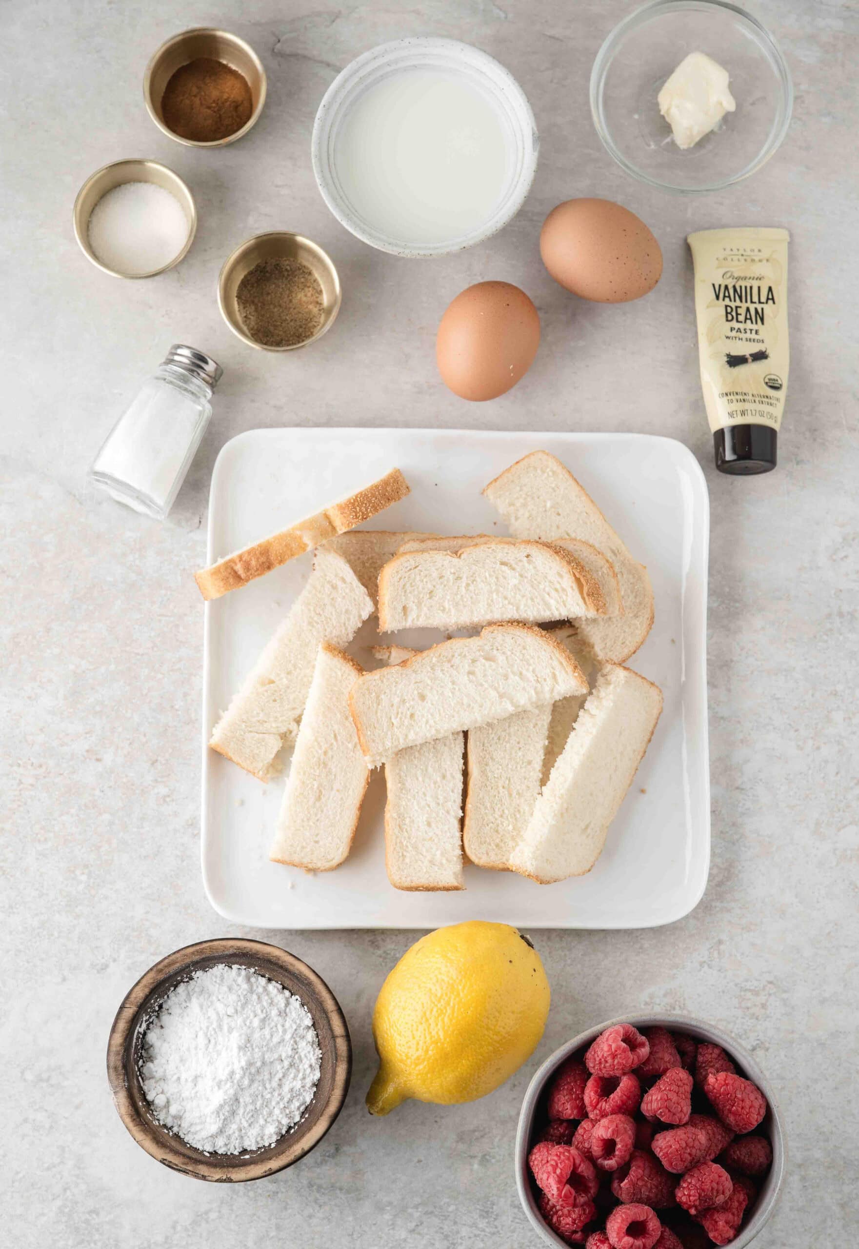 All ingredients shown to create air fryer french toast sticks and homemade raspberry sauce