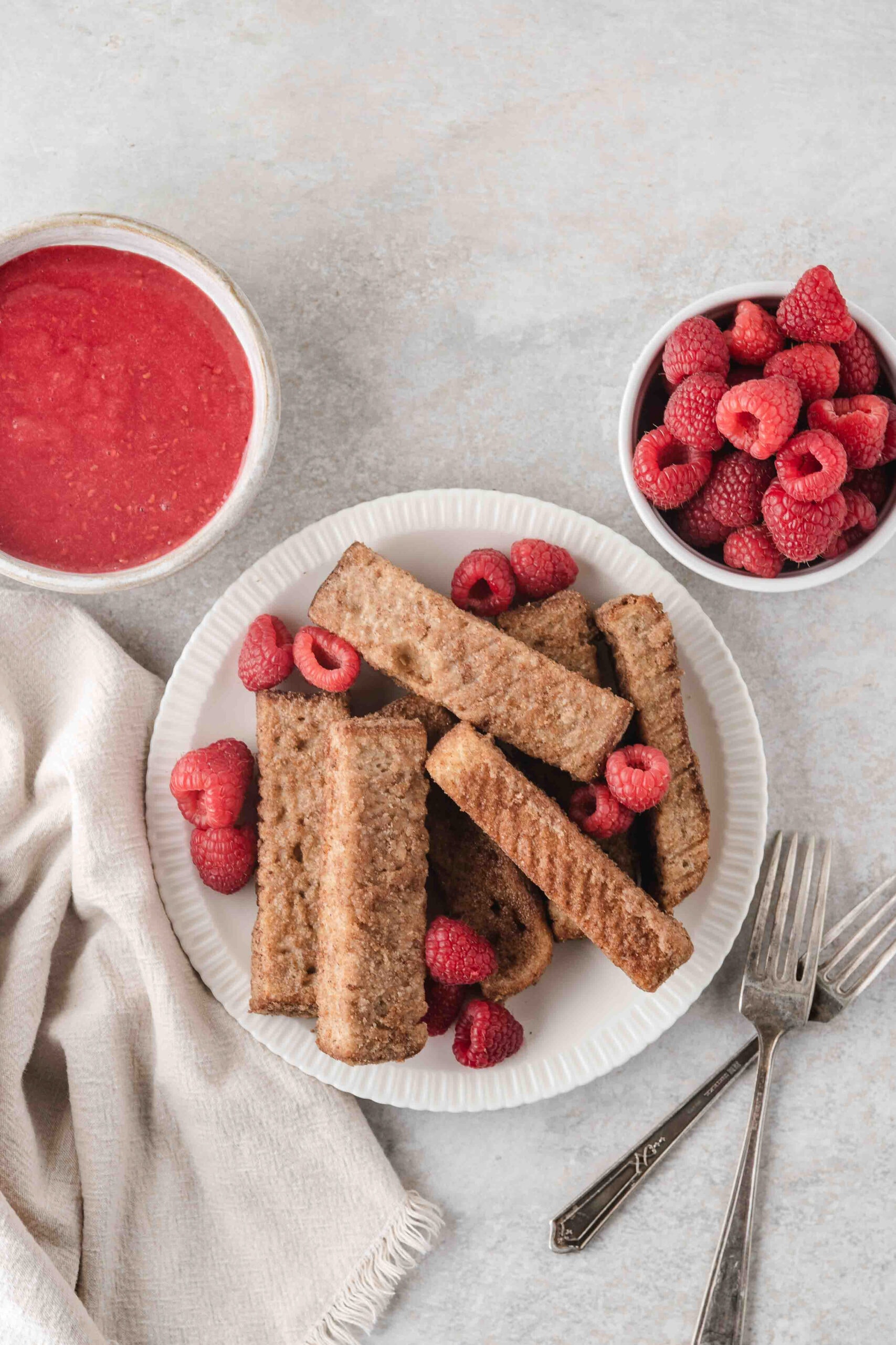 French toast sticks plated and ready to be eaten
