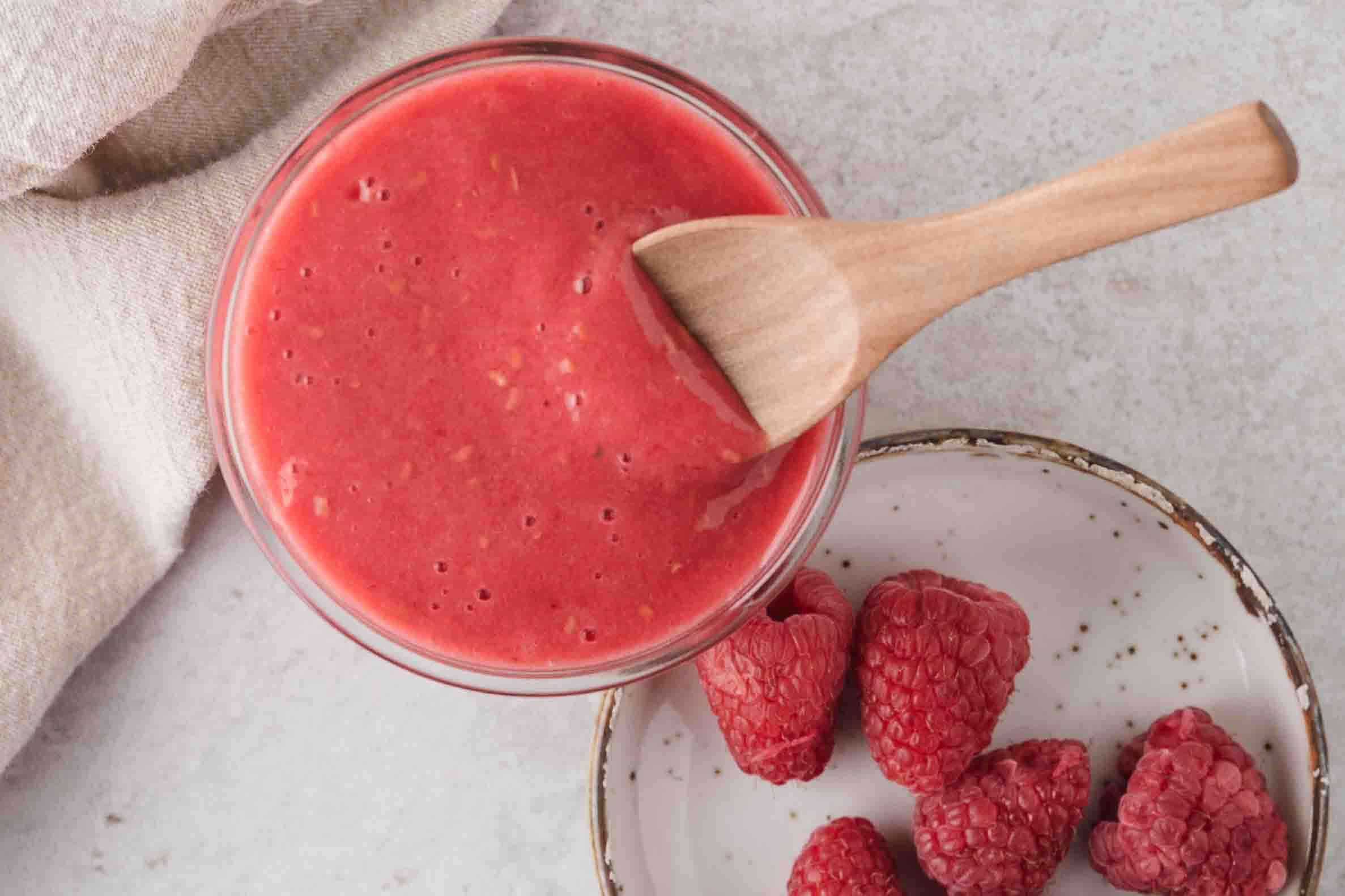 Homemade raspberry sauce all made and ready to be used with french toast sticks