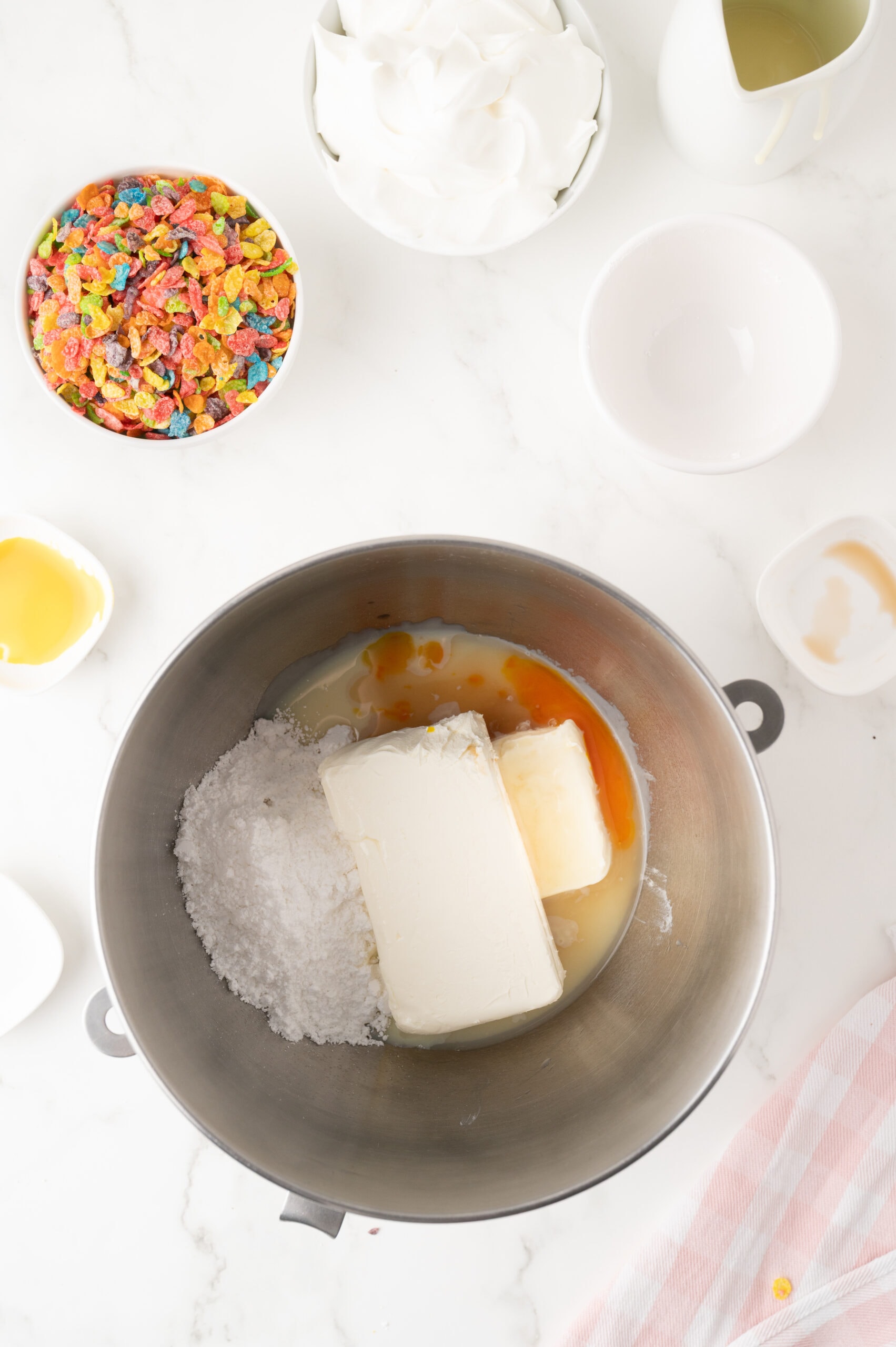 Ingredients in mixing bowl to create the cheesecake batter