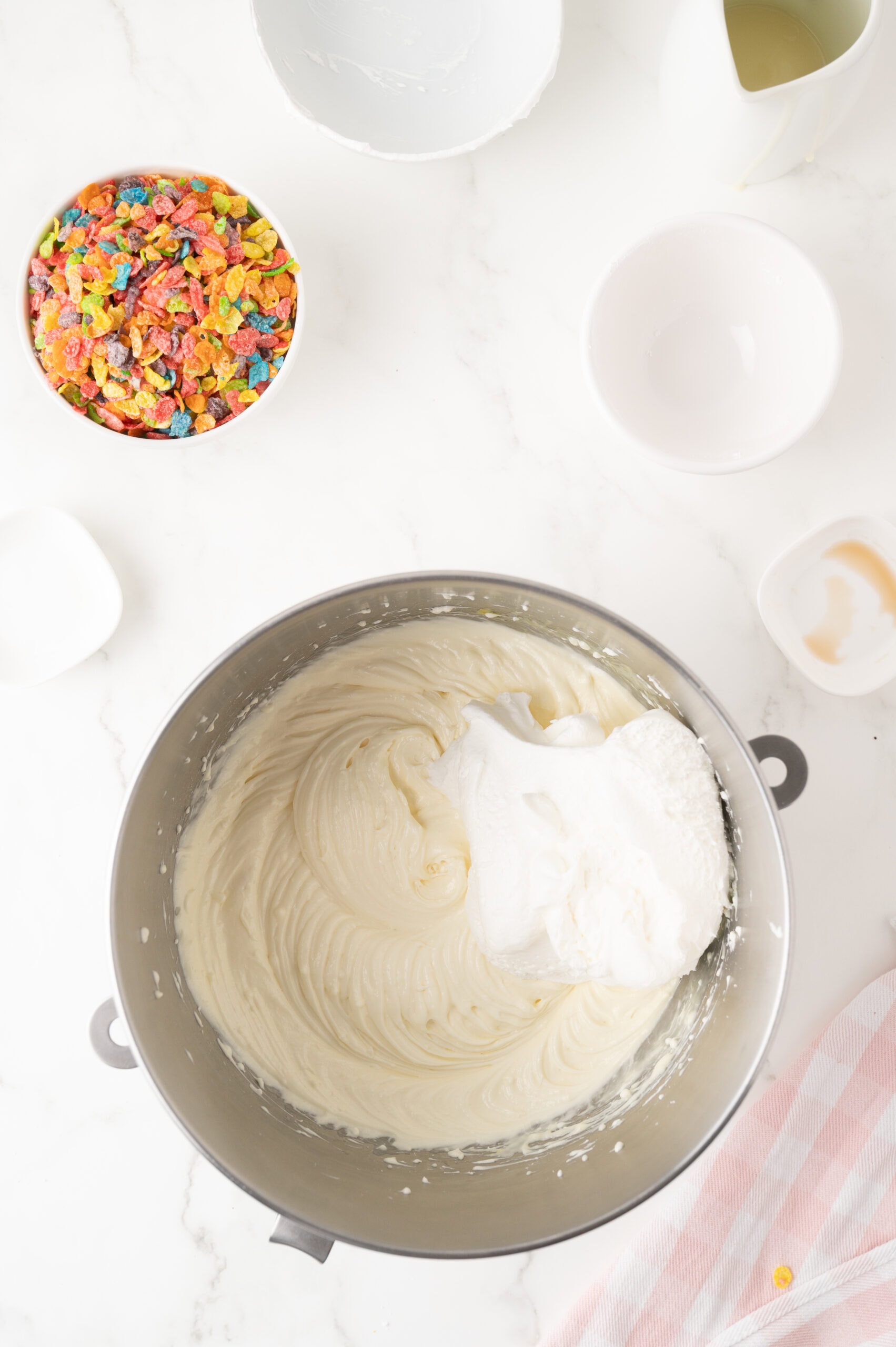 Mixing bowl with beaten cream cheese
