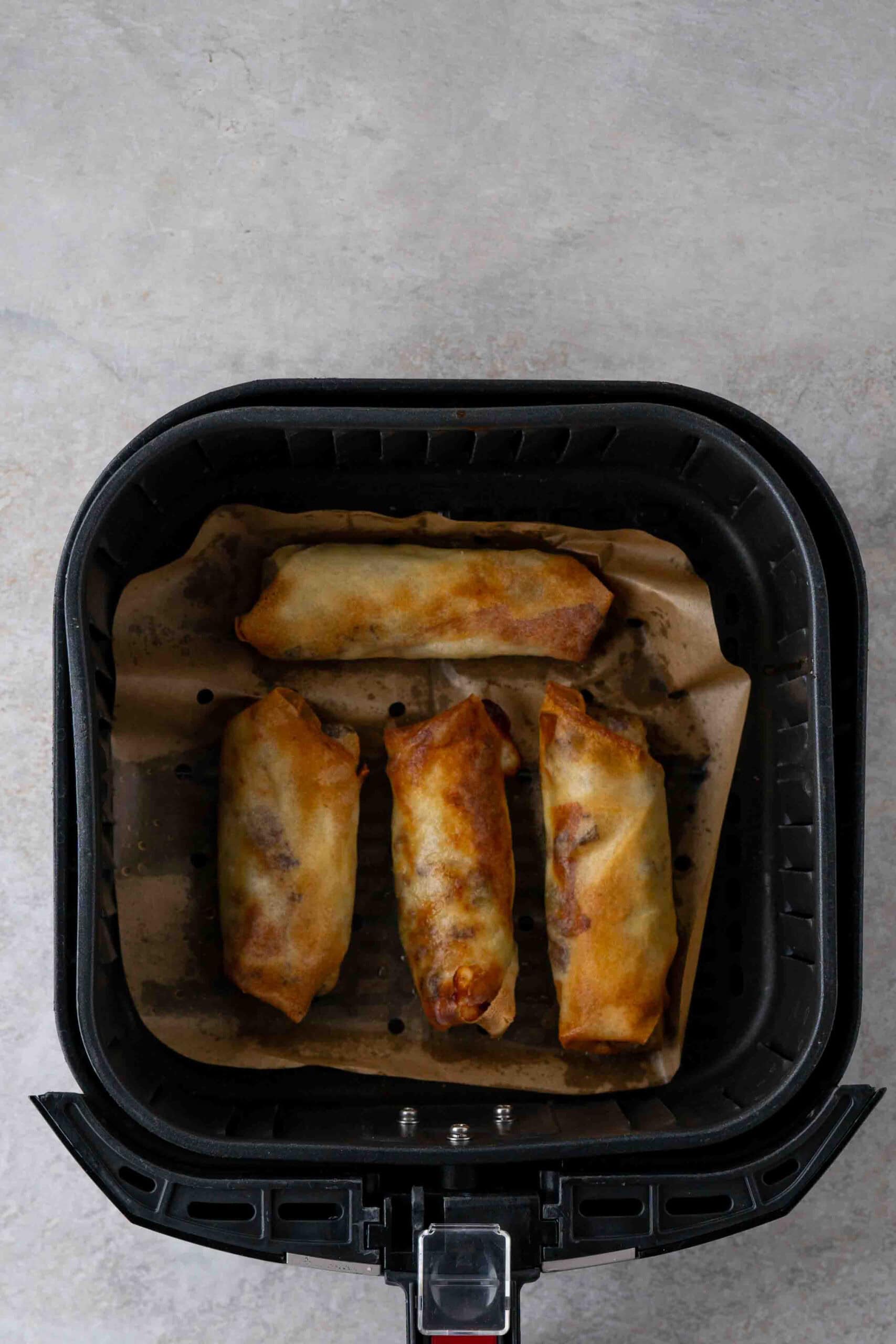 Philly Cheese Steak Egg Rolls right out of the air fryer and ready to be cooled and eaten