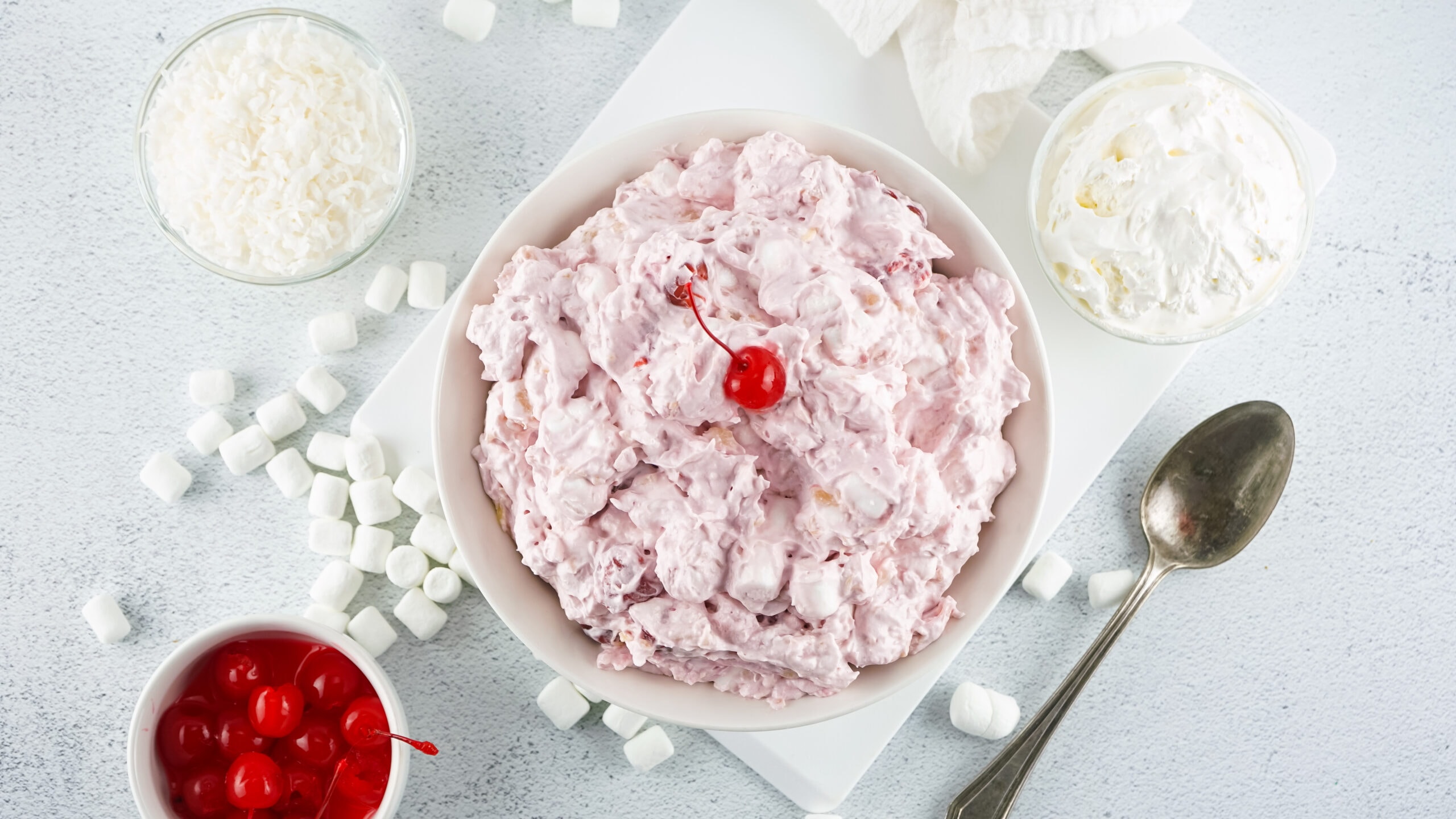 Cherry Fluff salad all mixed together, served in bowls, ready to be enjoyed