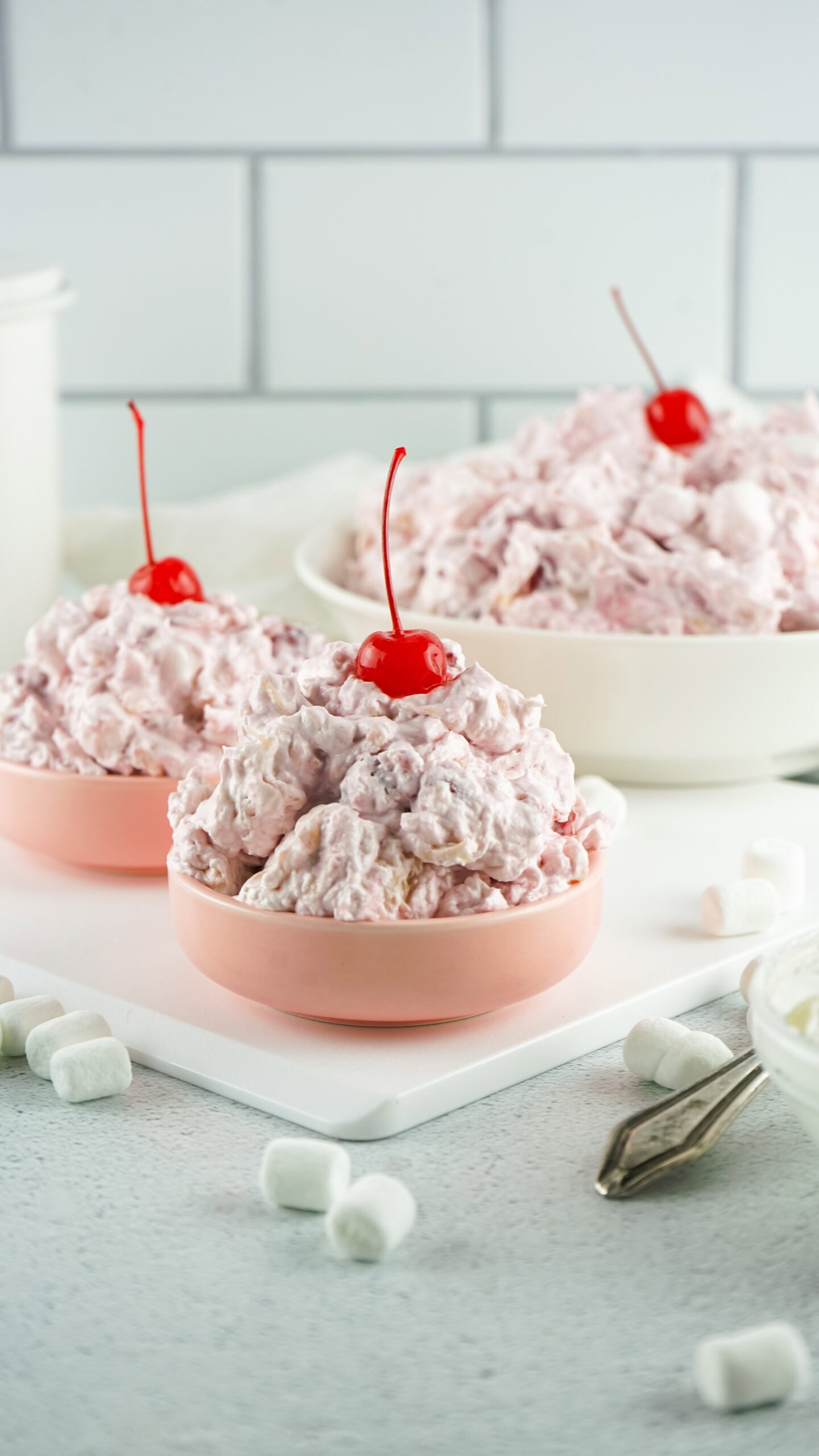 Cherry Fluff all mixed together, served in bowls and ready to be enjoyed