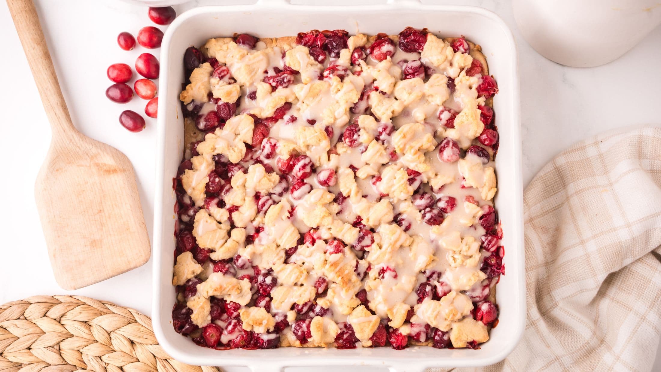 Cranberry bars are cooling, waiting to be cut and served