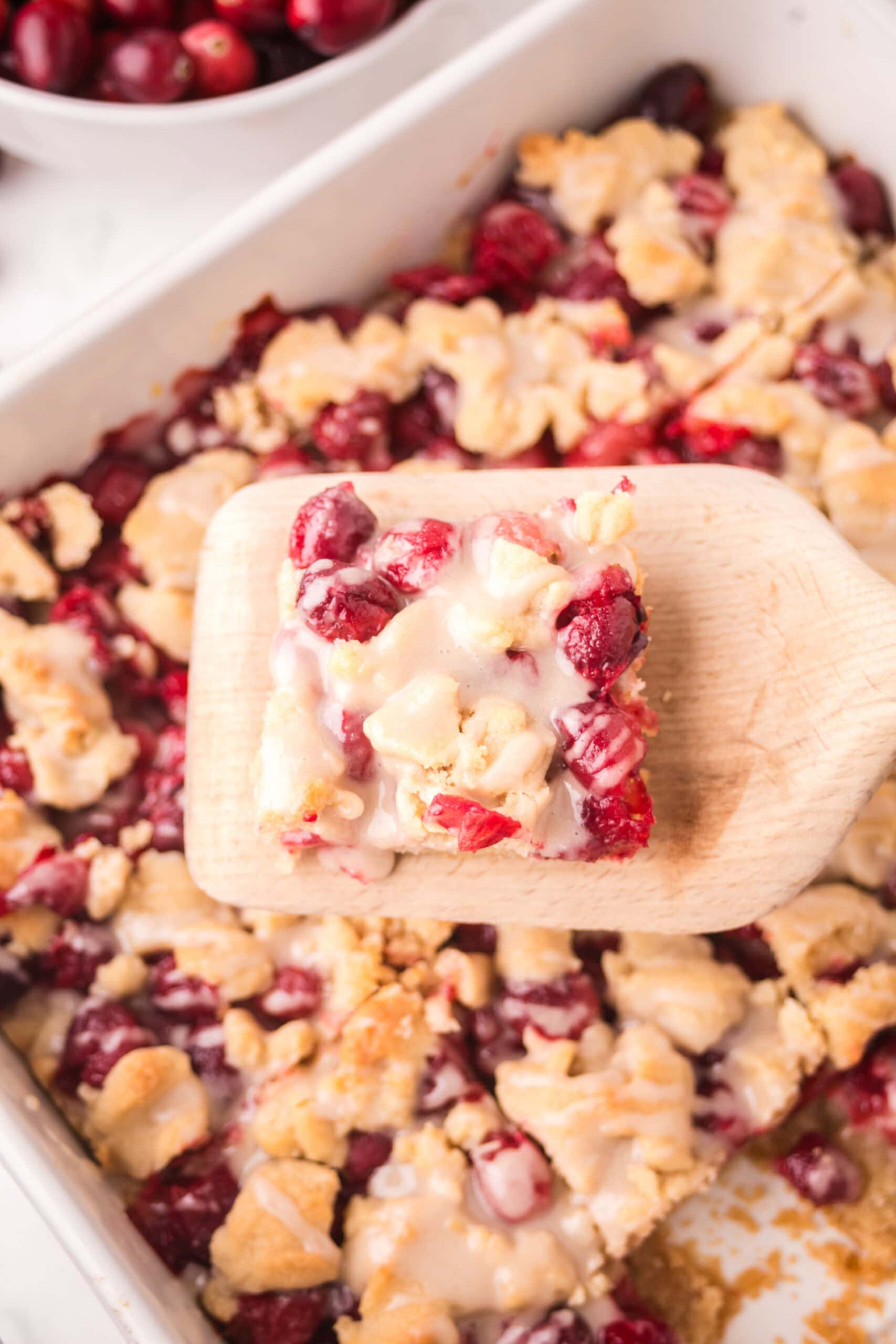 Cranberry bar shown in detail, on a wooden spatula