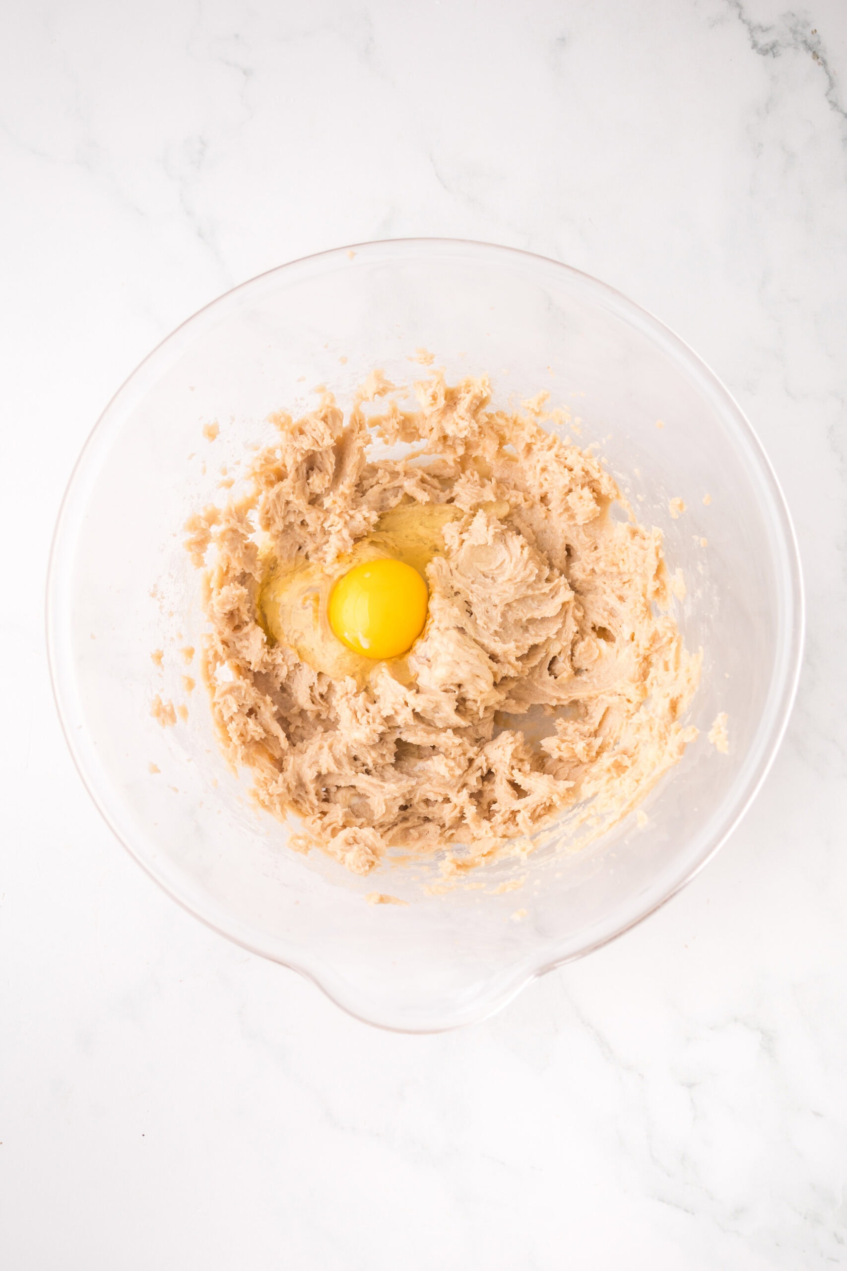 process of making the cookie base: brown sugar and egg