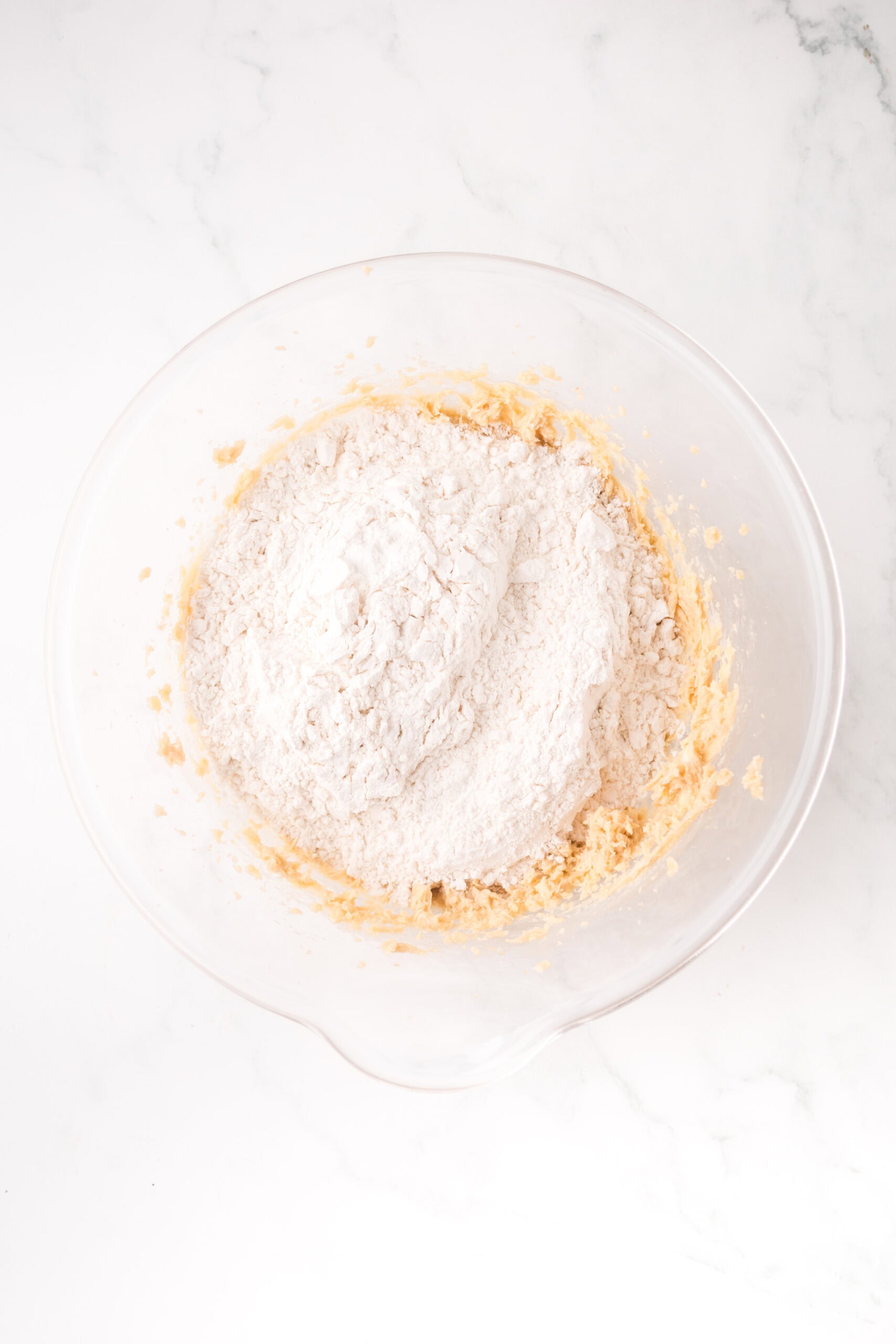 Process of making the cookie base: flour, brown sugar, egg, baking powder, baking soda