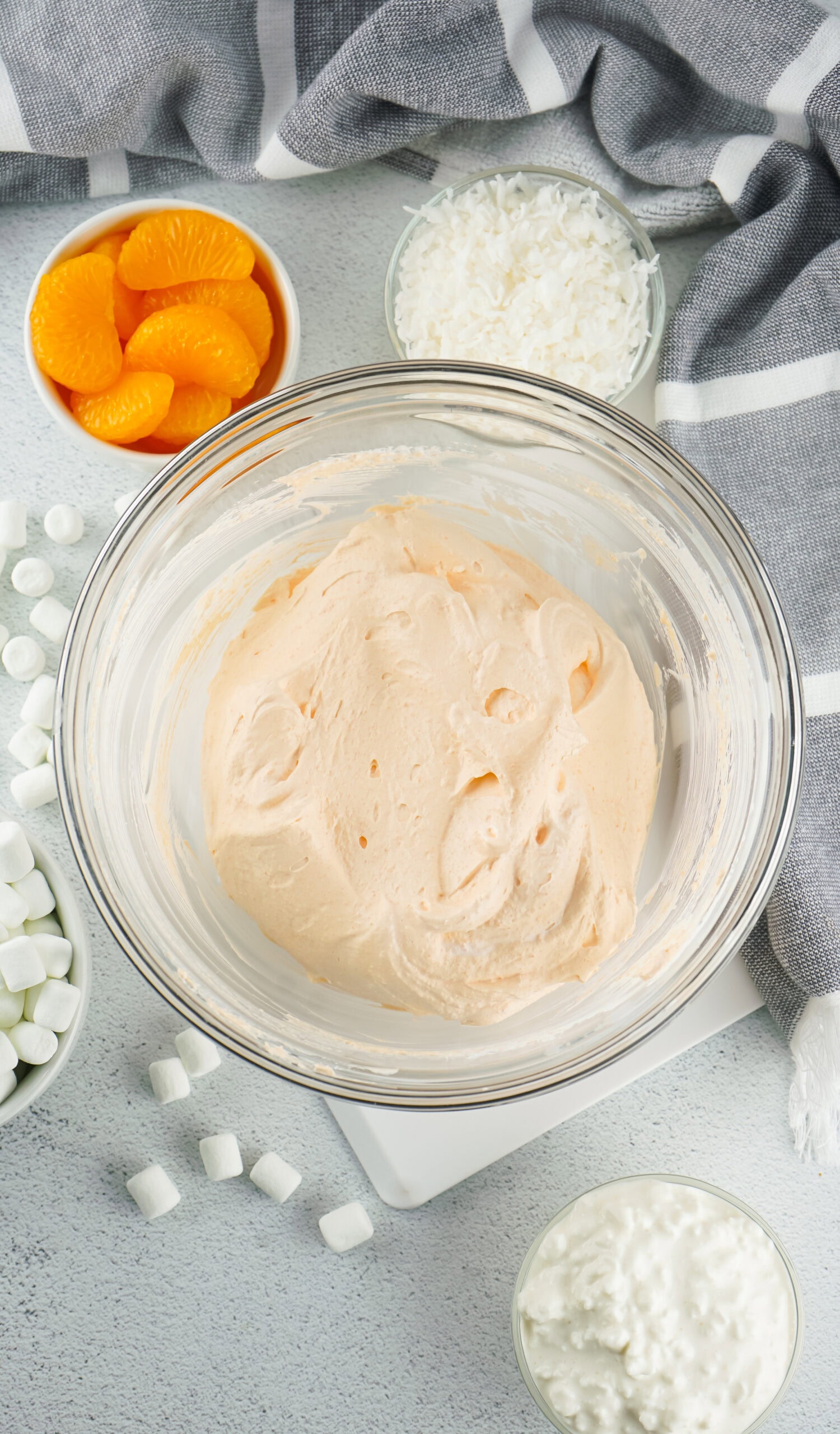 Mixed up gelatin powder and whip cream, all smooth in the bowl