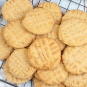 a close up of air fryer peanut butter cookies on a wire rack