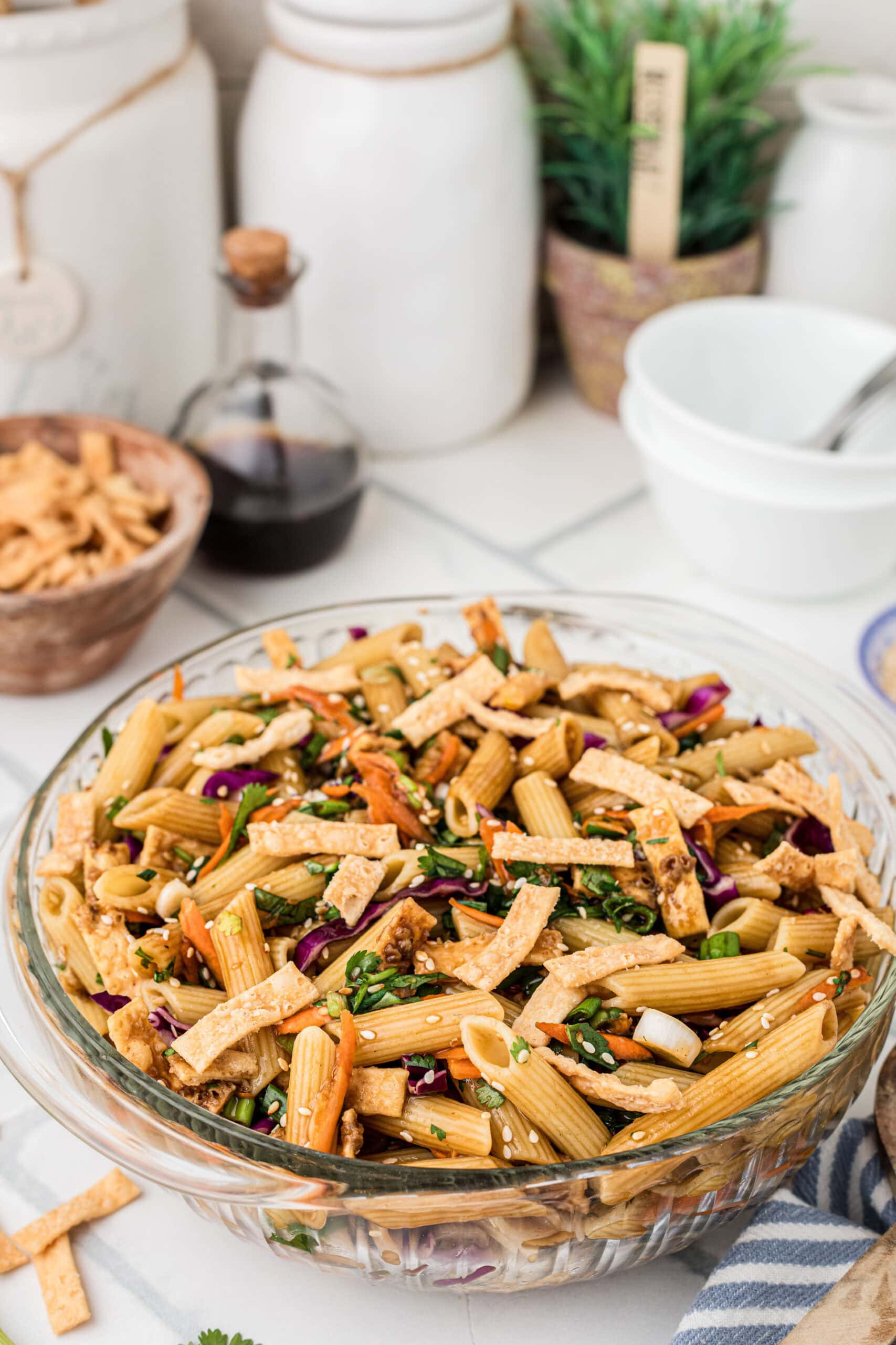 Asian Pasta Salad in glass bowl ready to be served