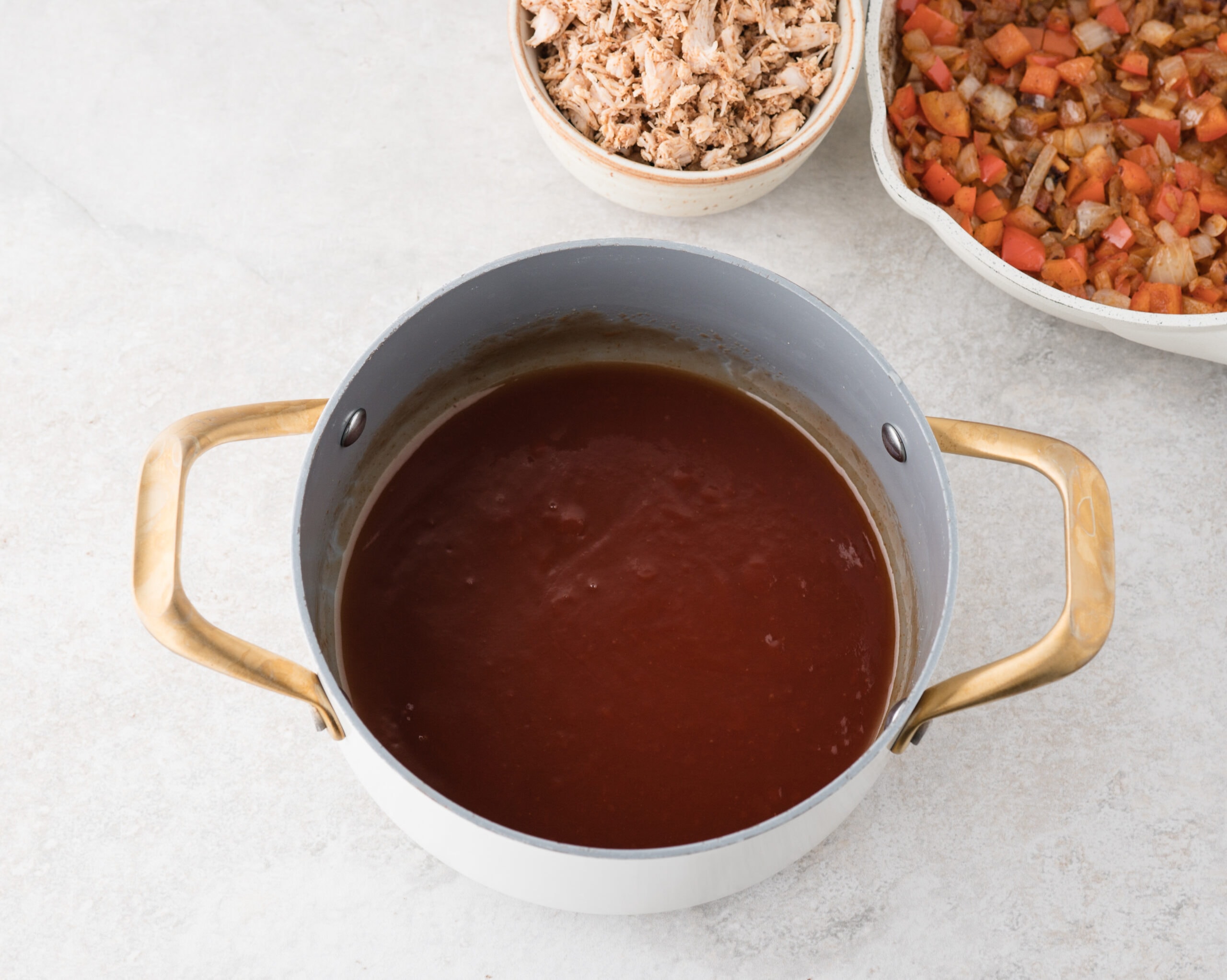 In a saucepan, add ketchup, brown sugar,BBQ rub, vinegar, and hot sauce.