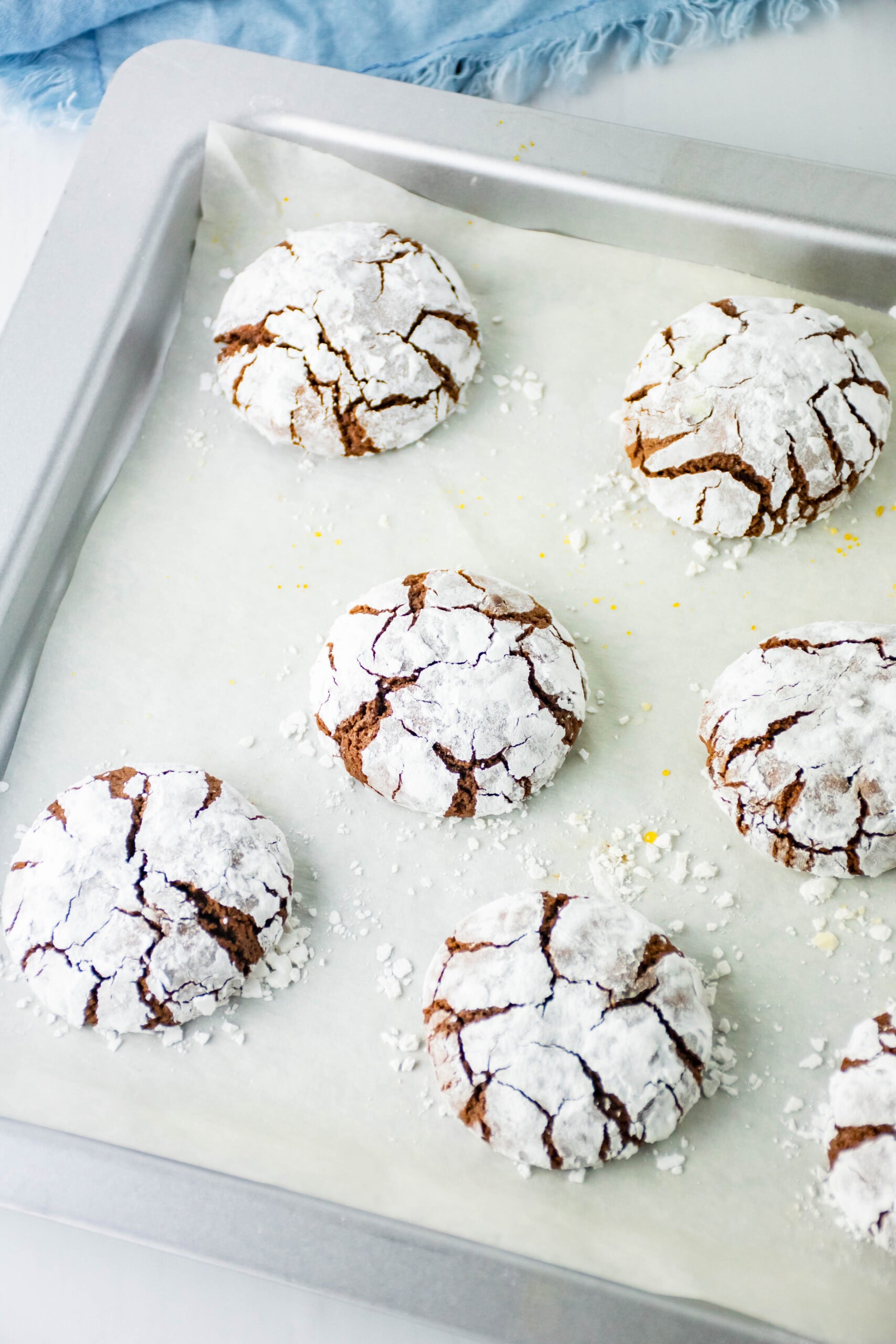 Baked brownie cookie crumble cookies on sheet pan cooling