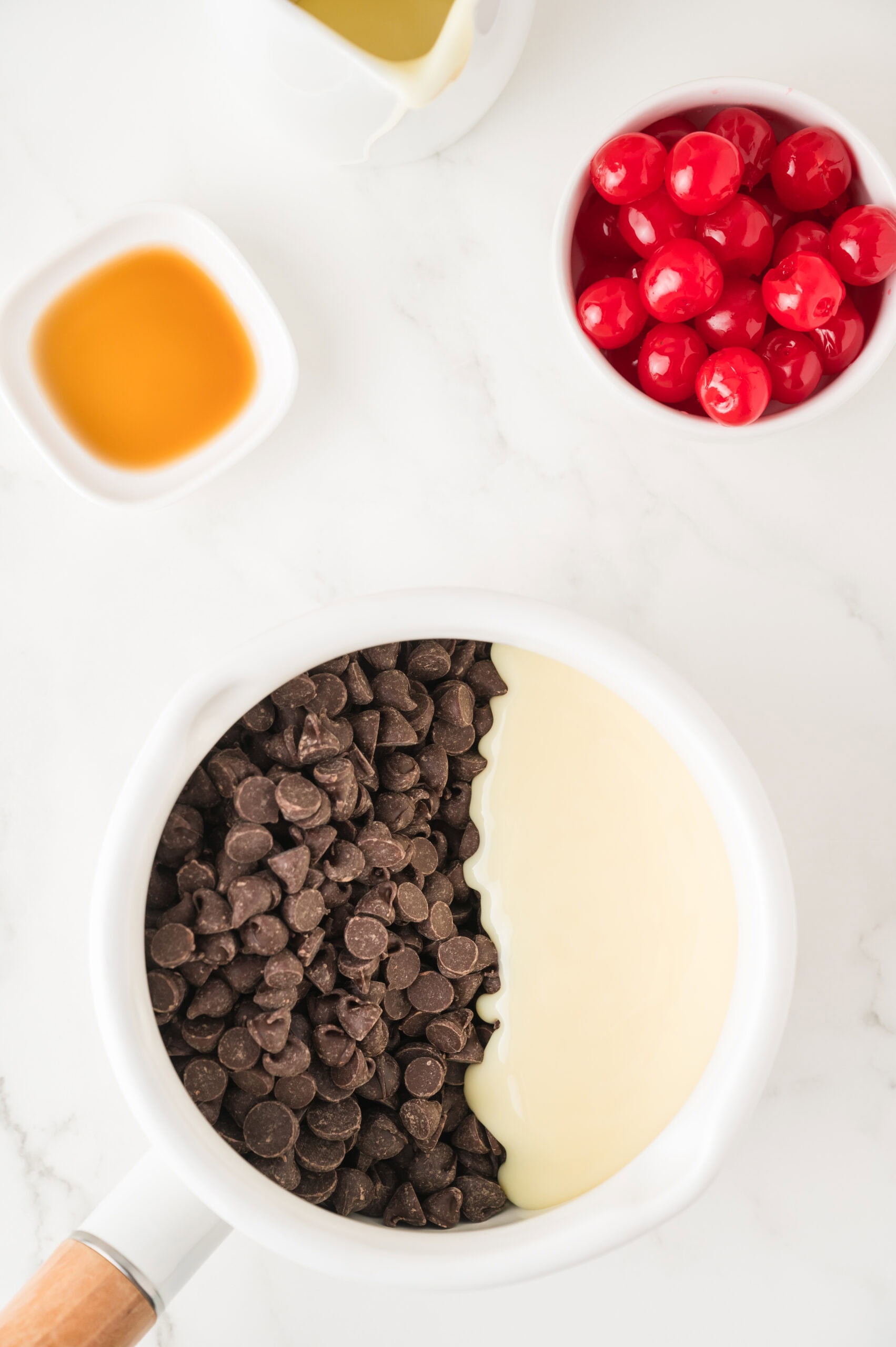 Process of making the dark chocolate fudge with the ingredients: dark chocolate chips and sweet condensed milk