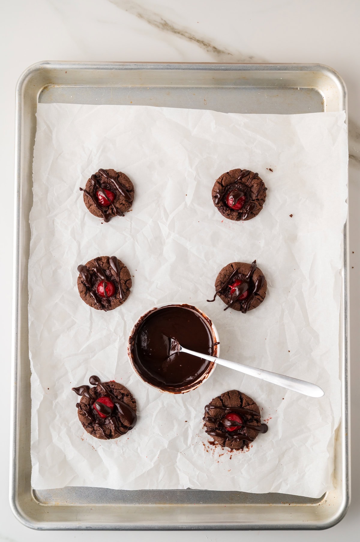 drizzle the Chocolate Covered Cherry Cookies with cherry chocolate ganache