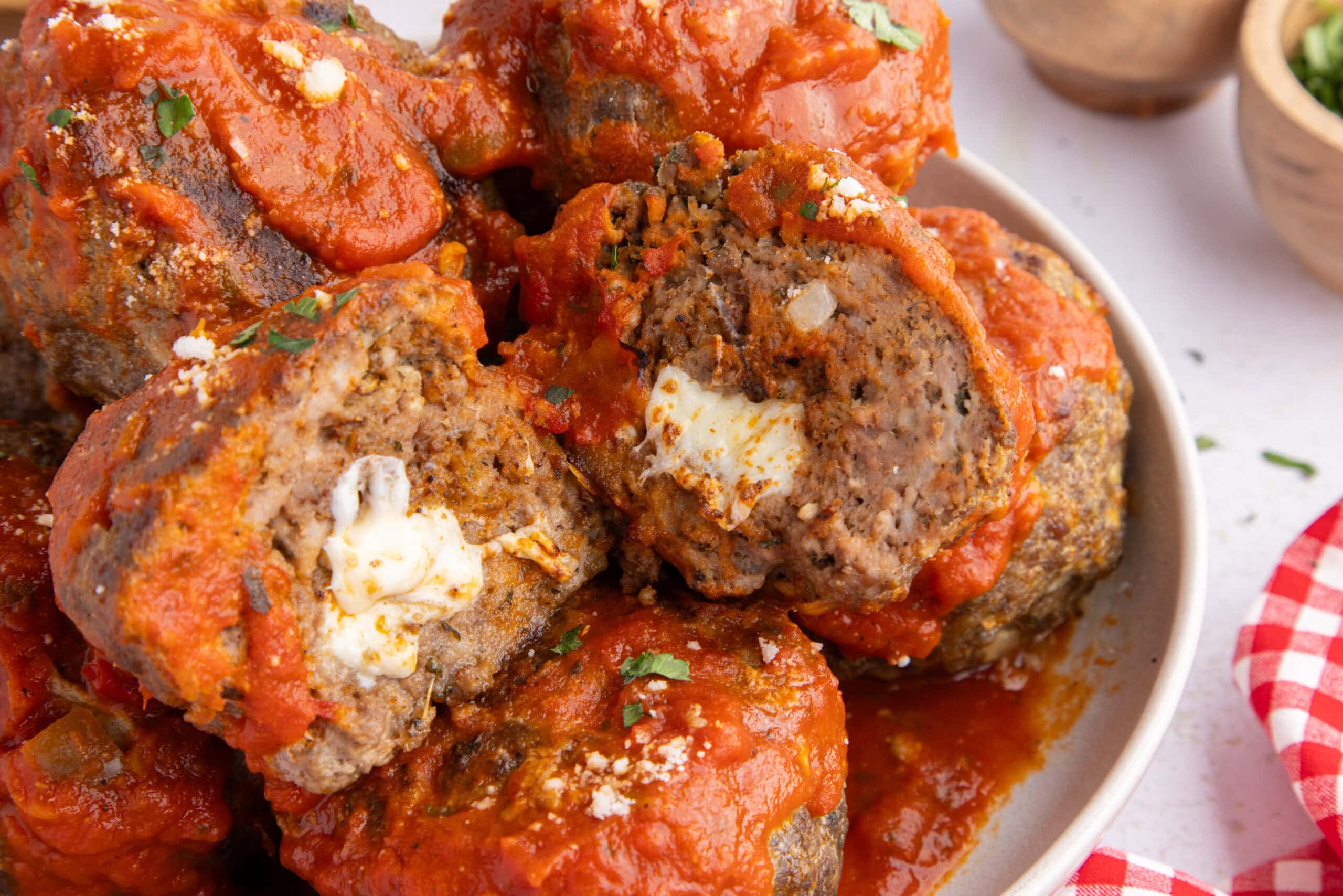 Close up of a plate of mozzarella stuffed meatballs. Ready to be enjoyed