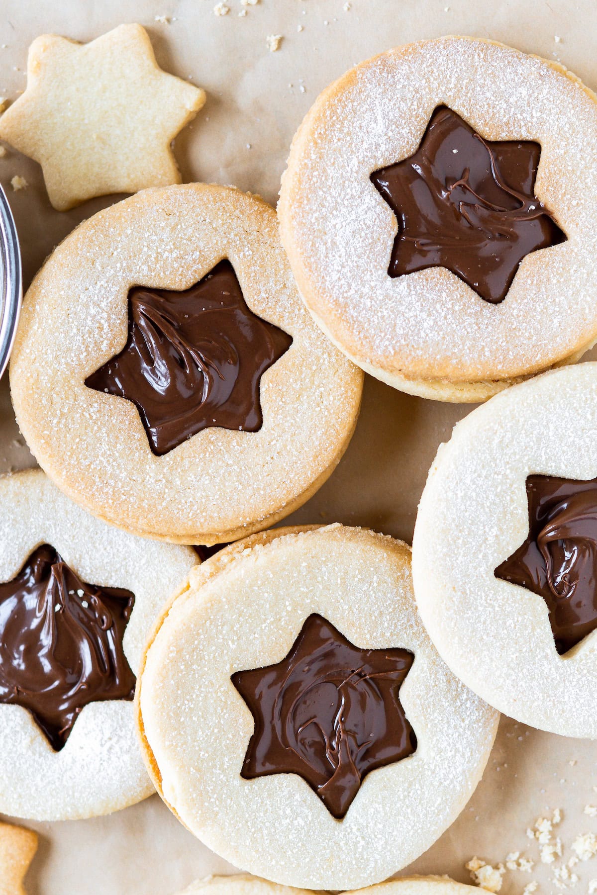 Linzer cookies stuffed with Nutella and dusted with powdered sugar