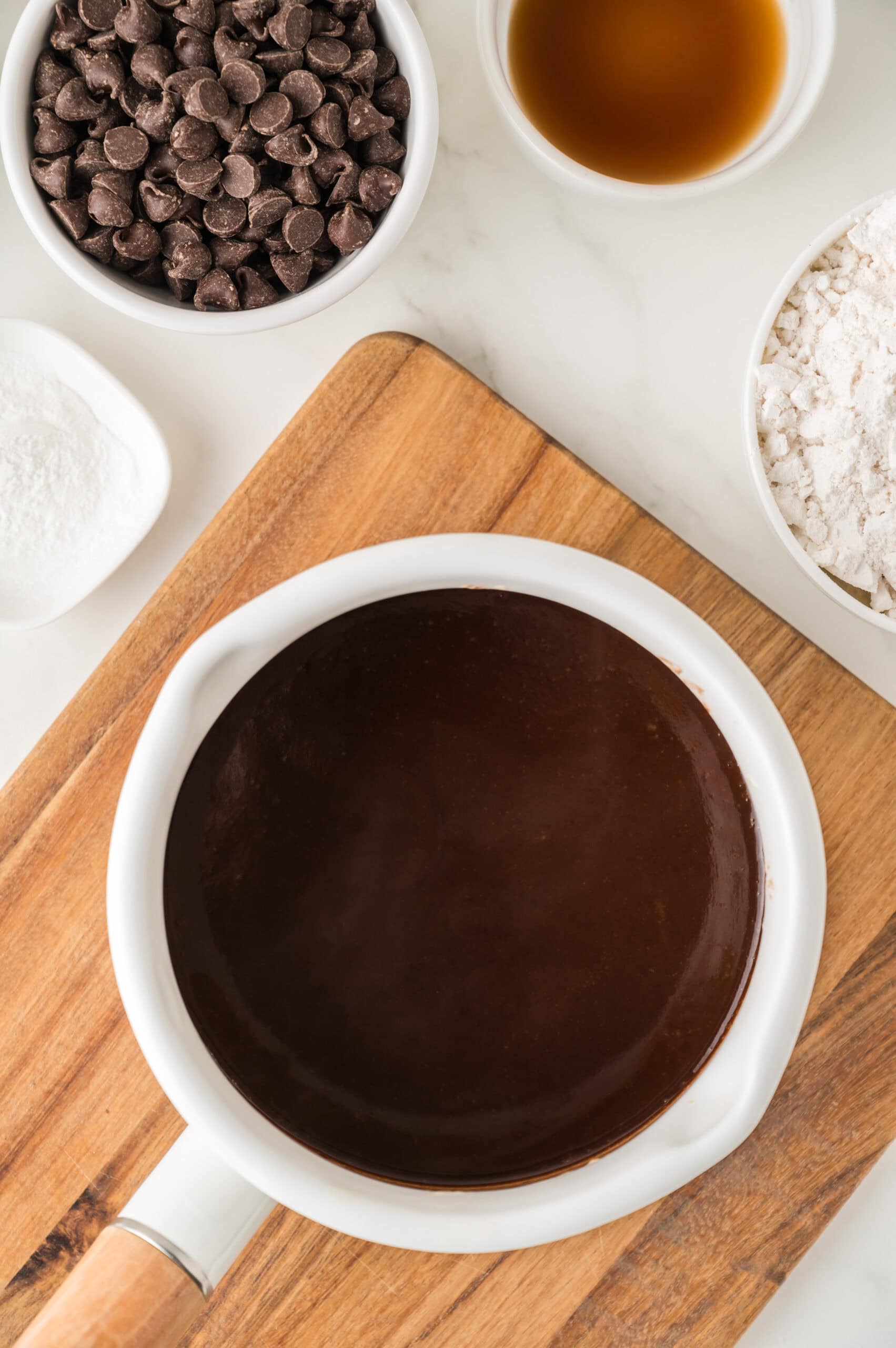 Melted butter and chocolate chips together in a pan
