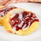Cherry danish all baked in the air fryer with almond glaze on top, ready to be enjoyed