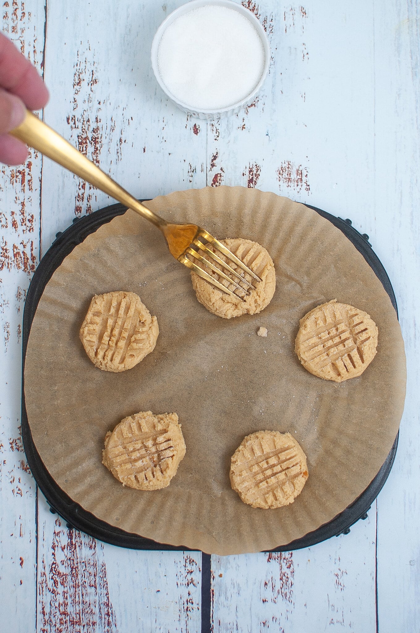 Making lines on the peanut butter cookie dough, final process step