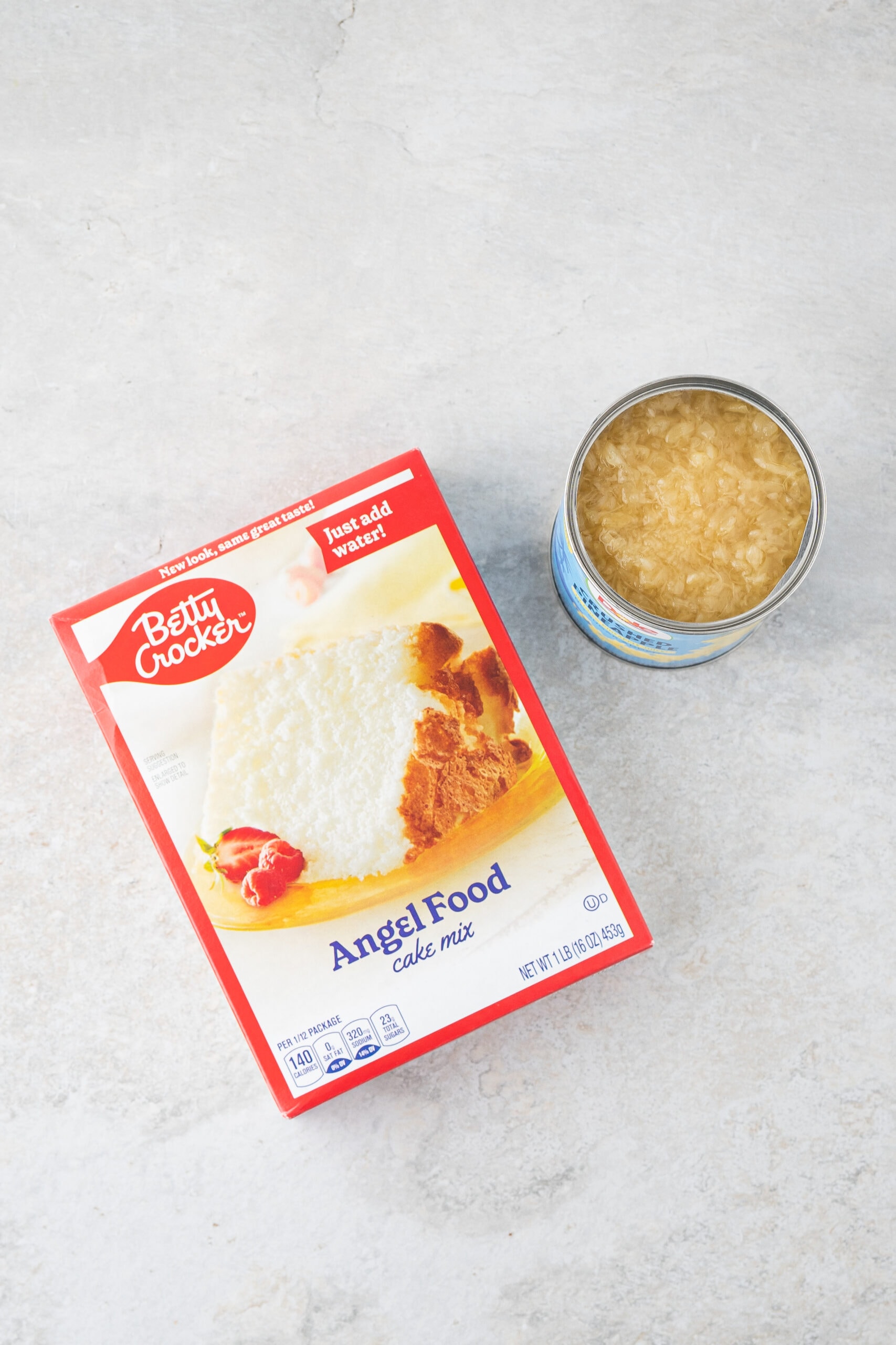All ingredients pictured: angel food cake box and can of crushed pineapple
