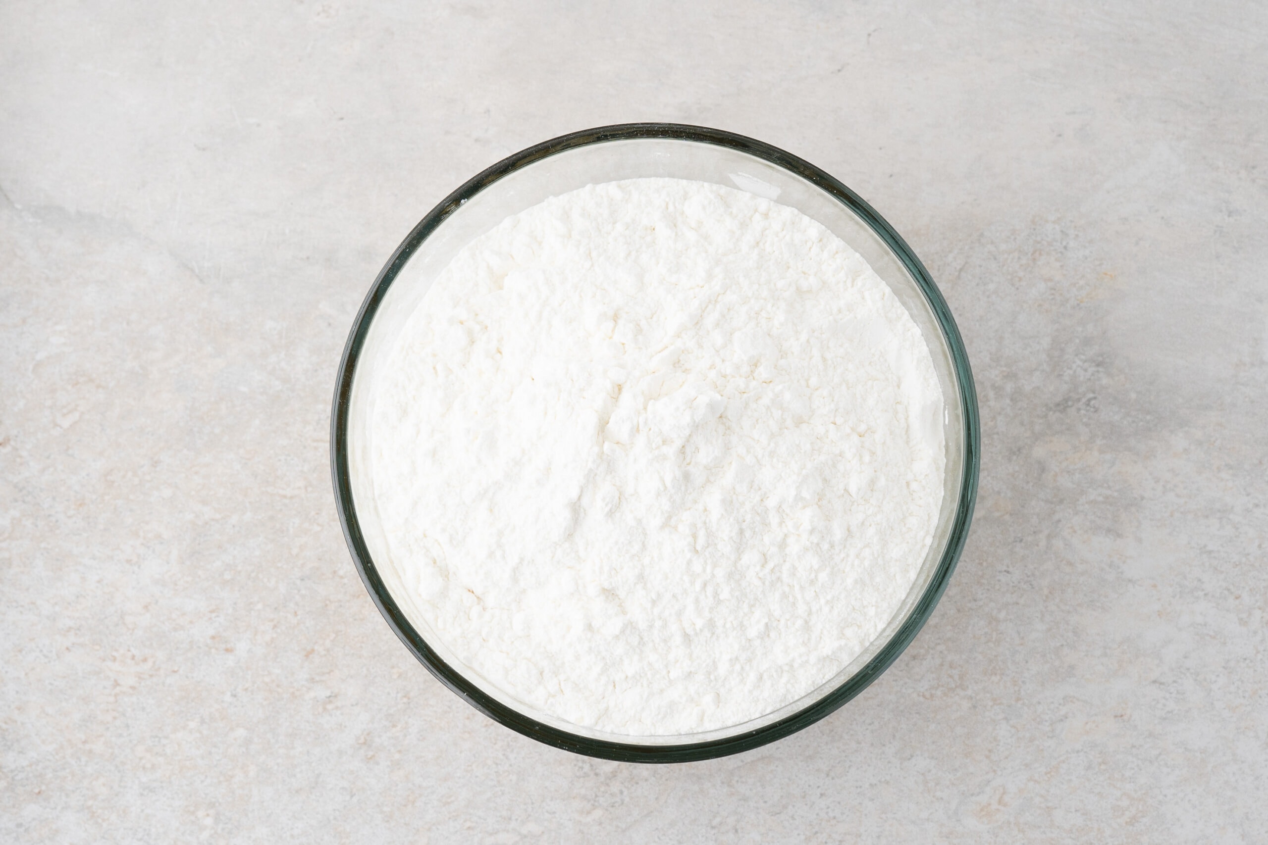 Angel food cake mix in mixing bowl ready to add the crushed pineapple