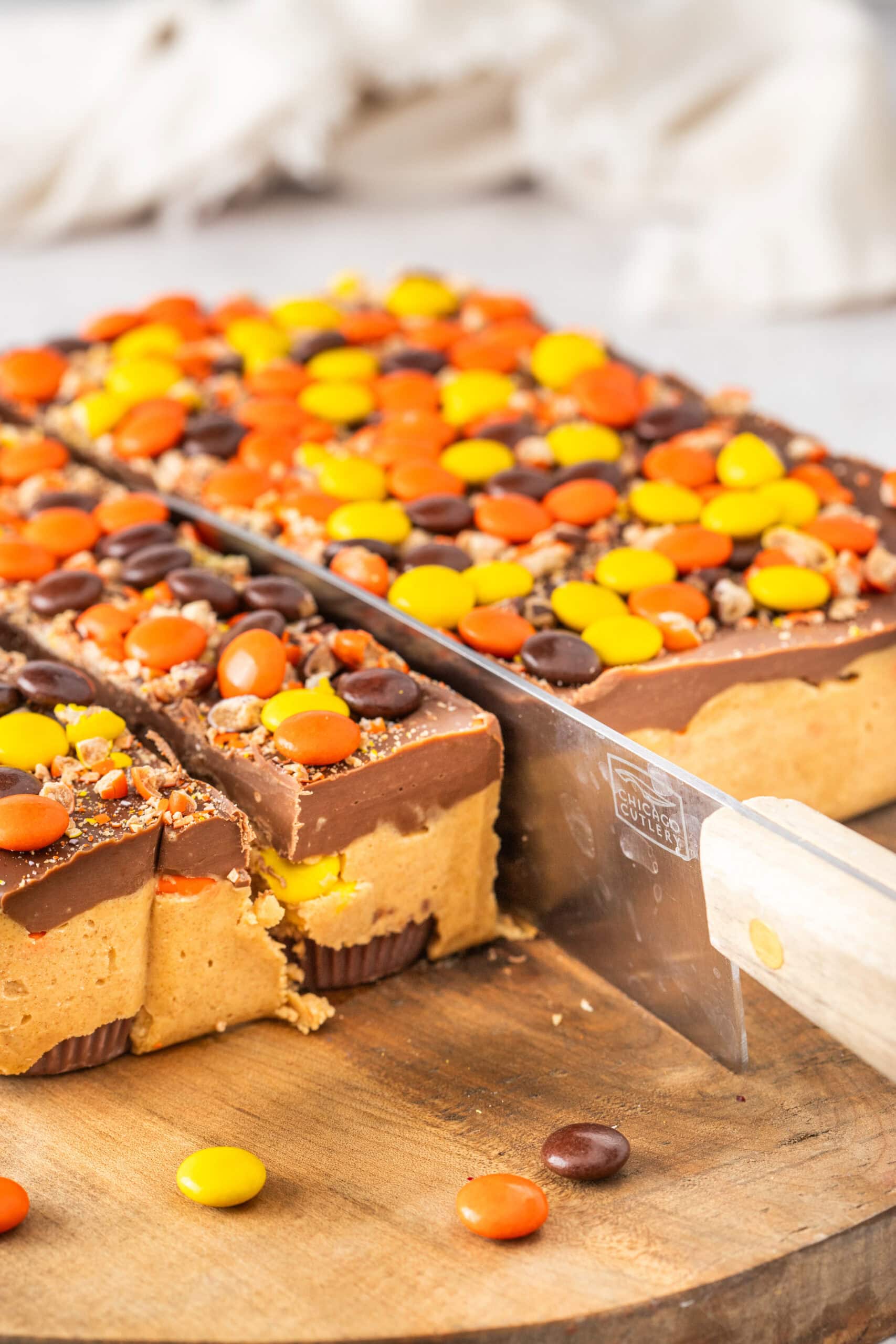 Cutting into the no bake bars to create bite size pieces