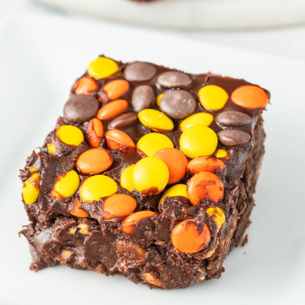 Close up of a Reese's Pieces brownie. Showing its texture and candy pieces.