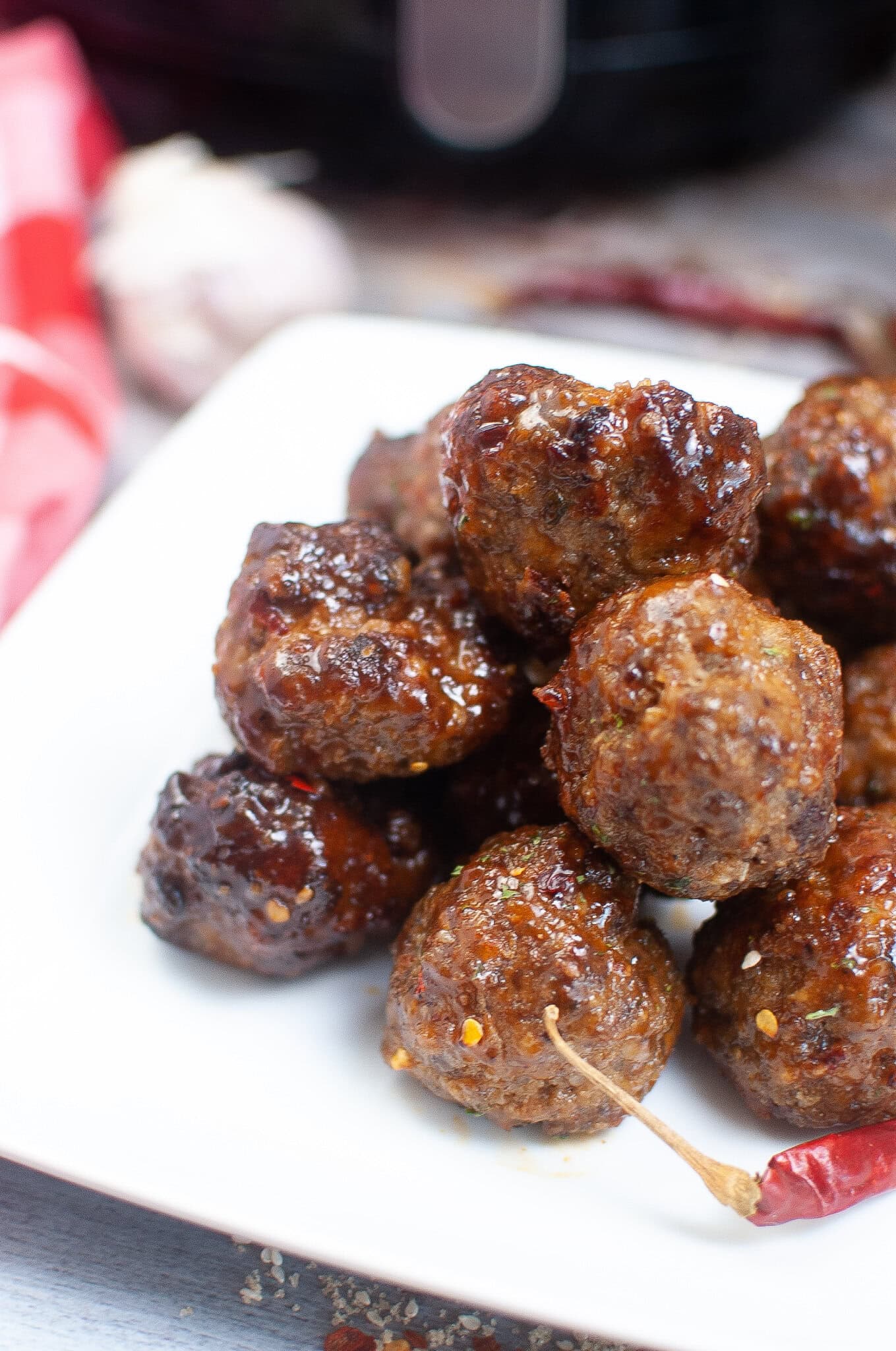 Air Fryer meatballs with firecracker sauce on a plate, ready to be served