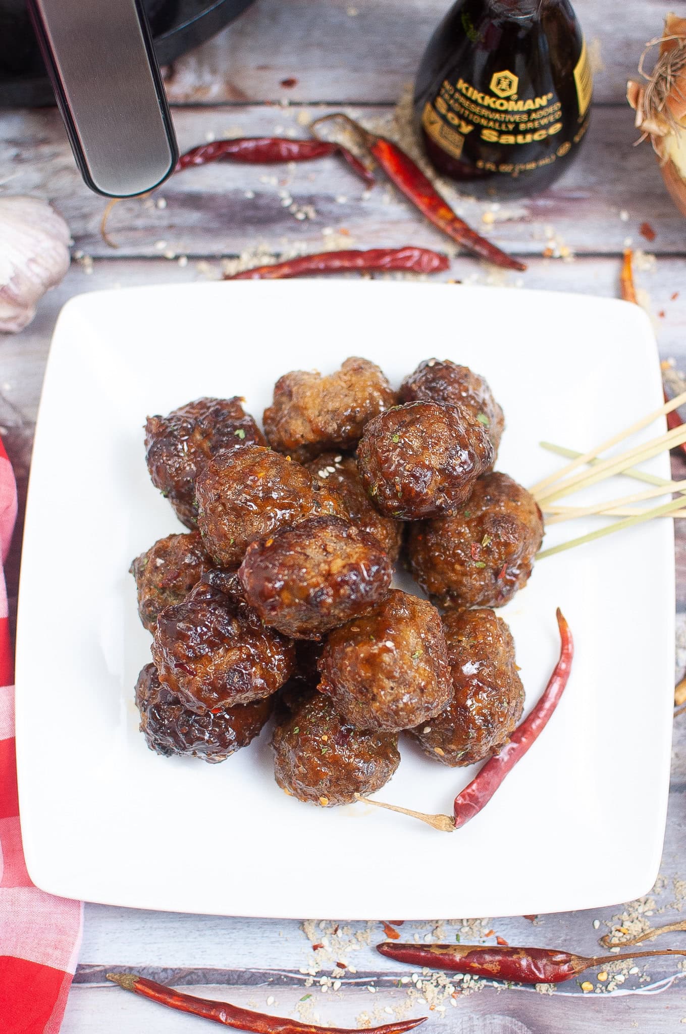Air Fryer meatballs with firecracker sauce on a plate, ready to be served
