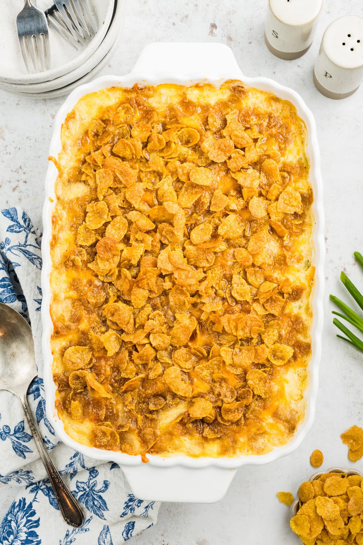 Party cheesy potatoes ready to be served, all baked and warm from the oven
