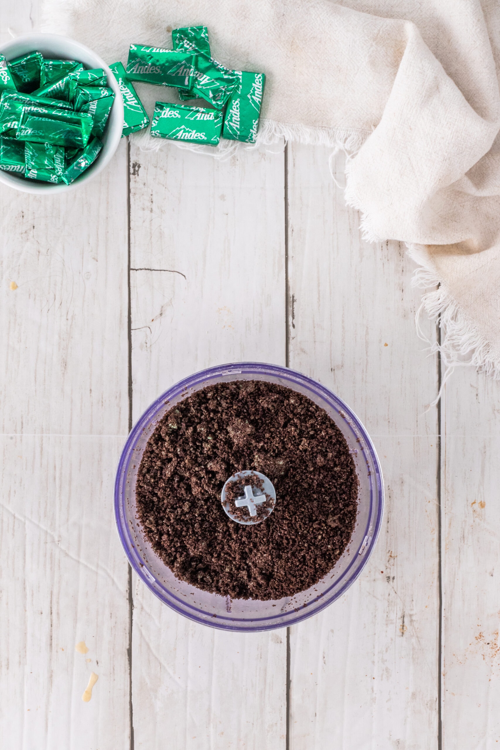 Crushing Oreo cookies being crushed in a food processor