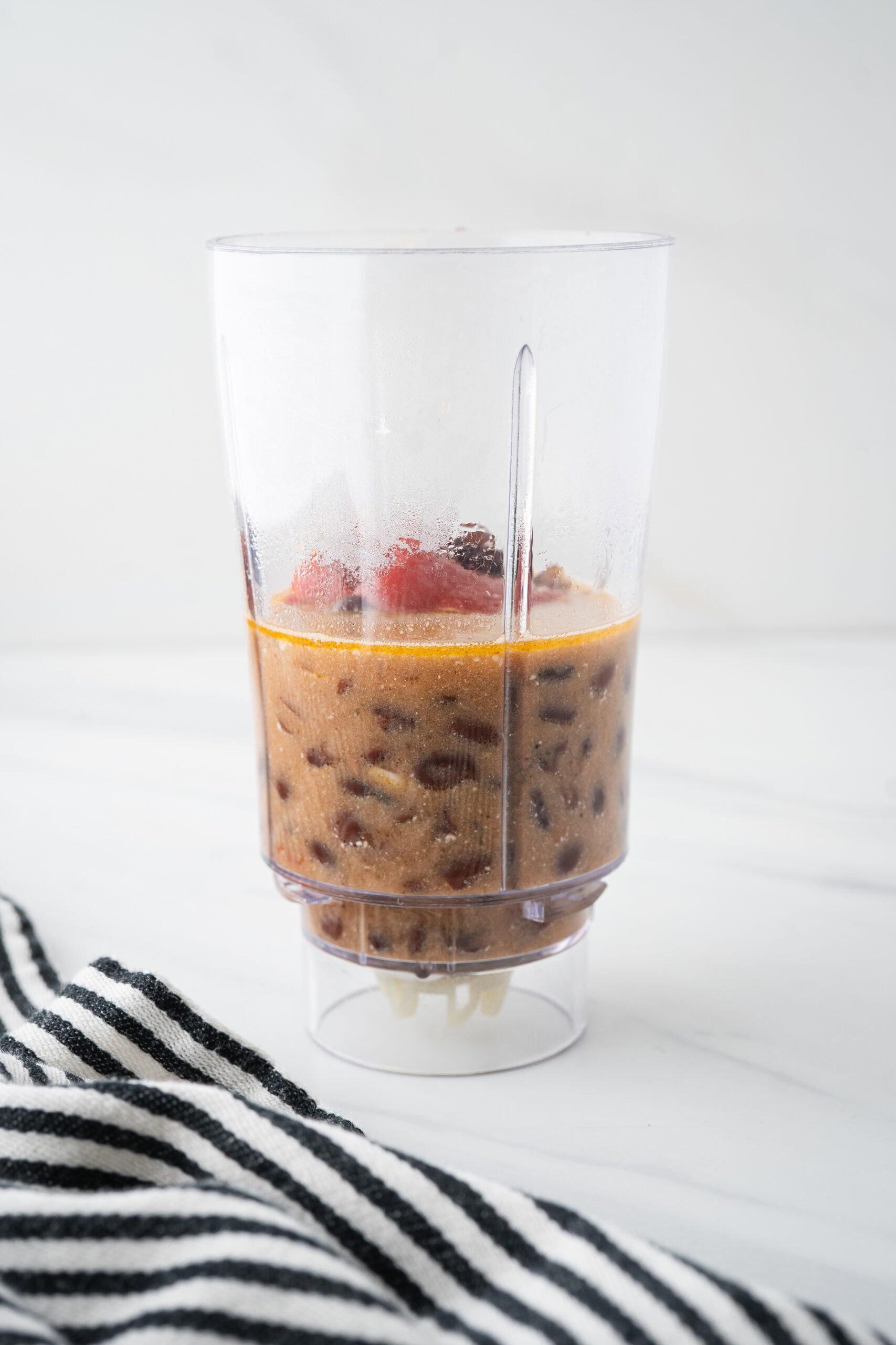 Soup placed in a food processor to be blended together