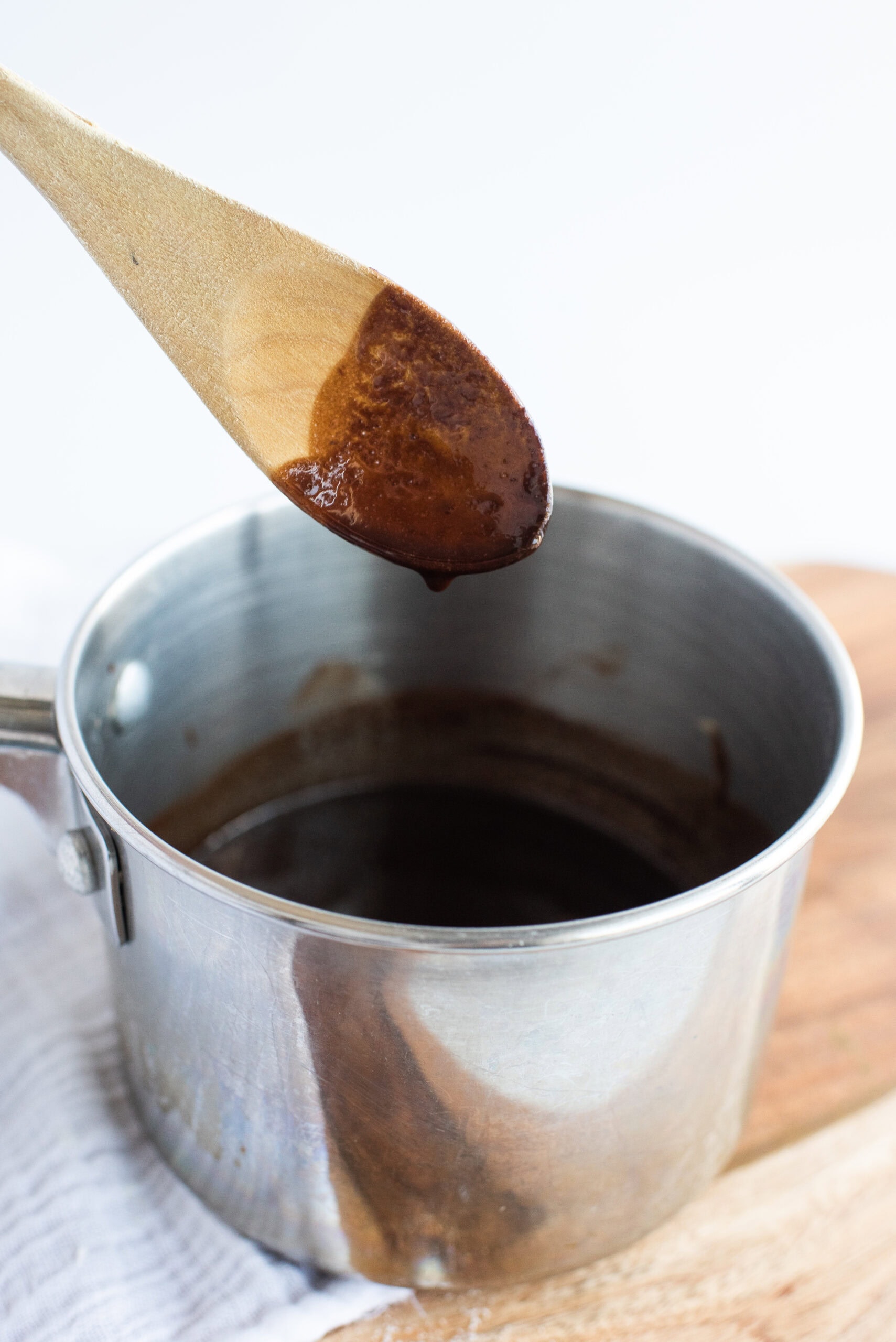 Chocolate square mixed with butter in bowl