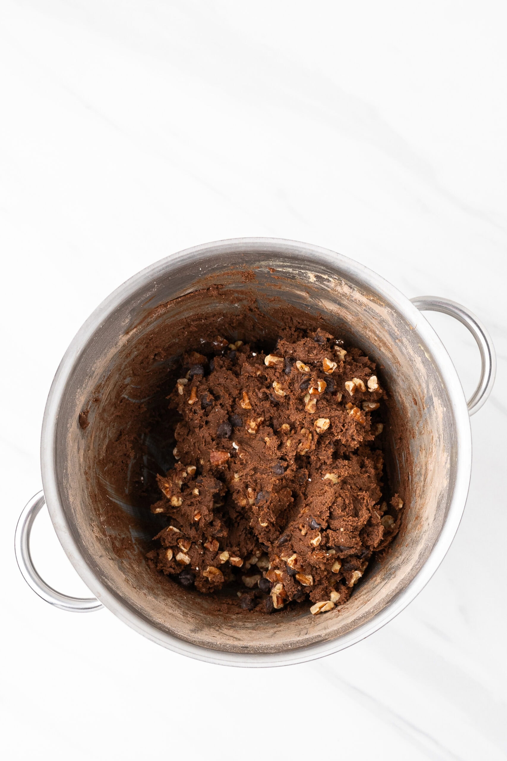 Chewy Double chocolate cookie dough all mixed in a bowl and ready to be scooped onto a baking sheet