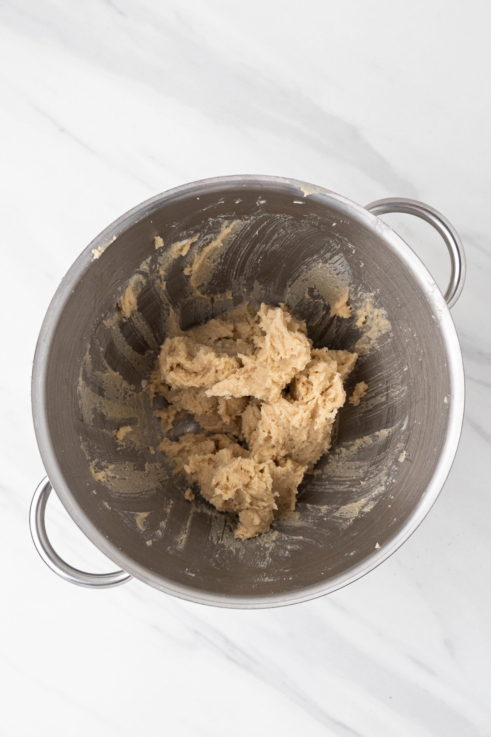 The butter and sugars are all creamed in a mixing bowl