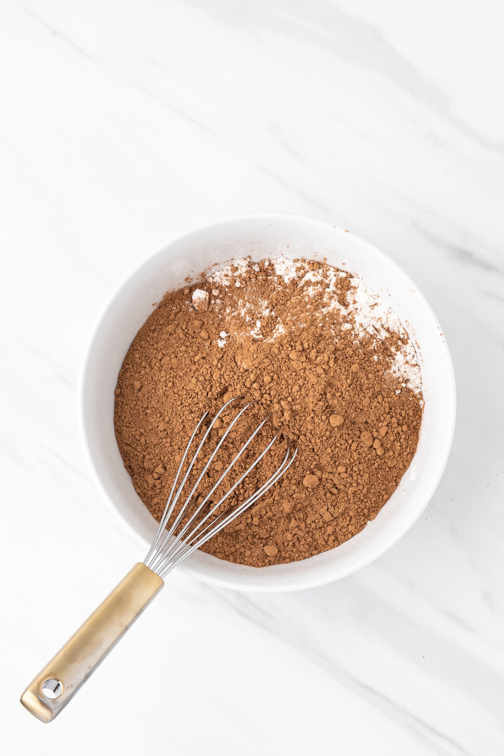 Whisking the cocoa powder, flour, baking soda and salt