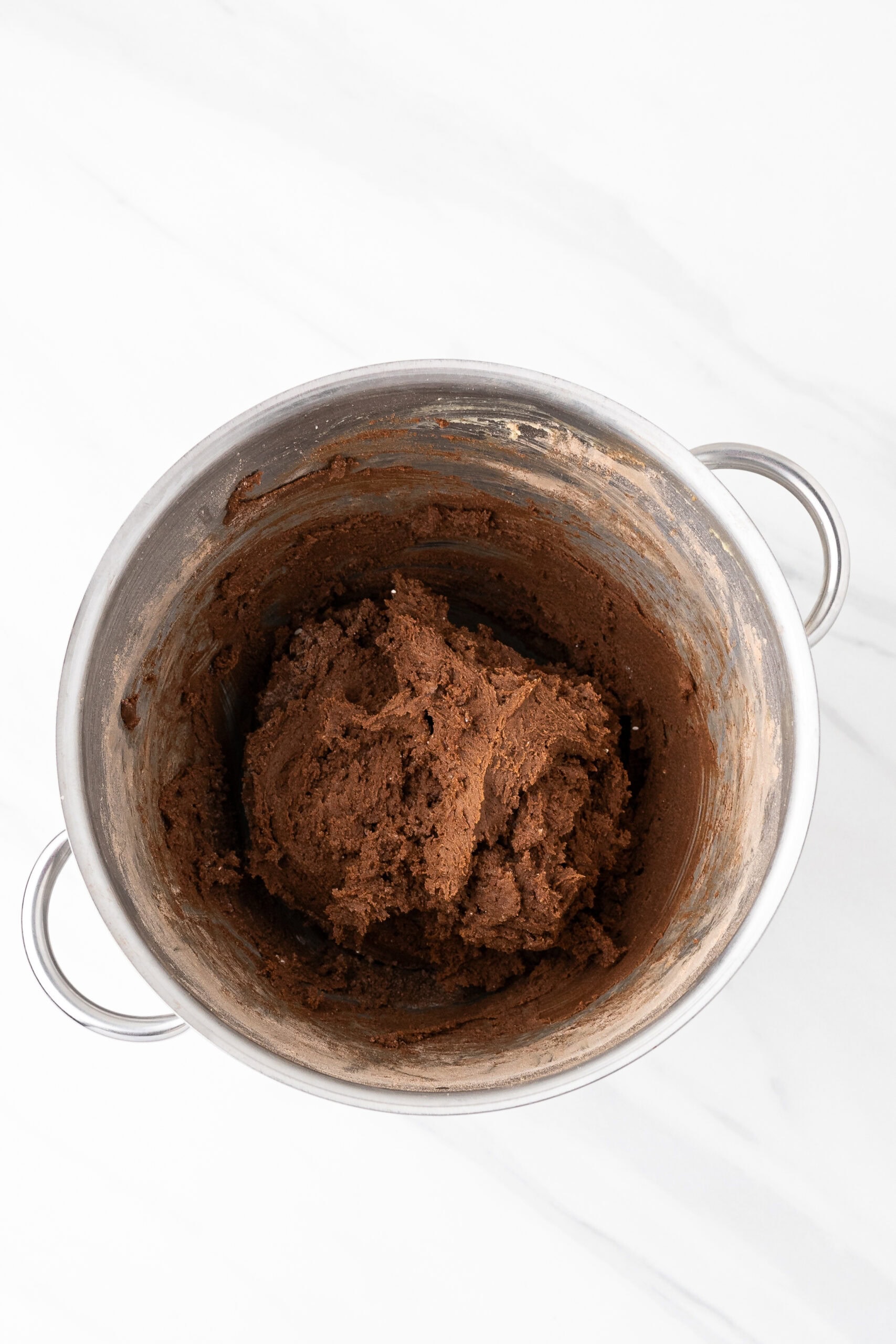 Whisking together the cocoa, flour, baking soda, and salt in a bowl