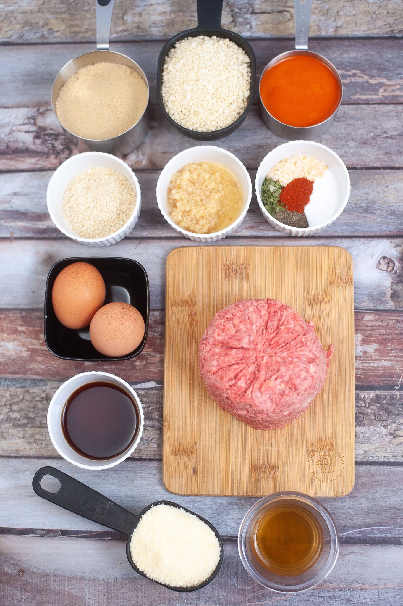 Ingredients to make air fryer meatballs with firecracker sauce: oil, garlic, salt, pepper, onion powder, paprika, eggs, panko breadcrumbs, parmesan cheese, sesame seeds, parsley, brown sugar, hot sauce, apple cider vinegar, soy sauce, garlic powder