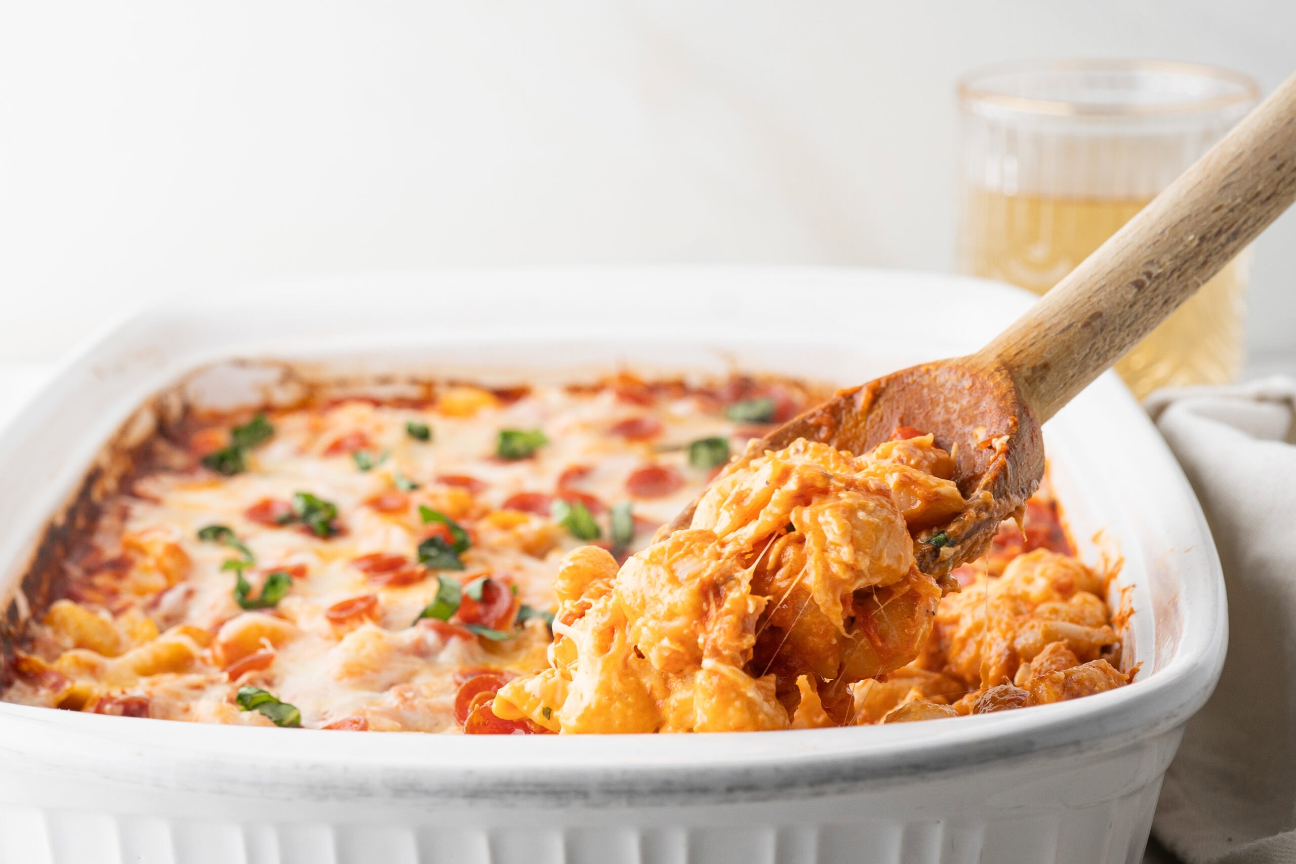 Scooping up a spoonful of pepperoni pizza mac and cheese